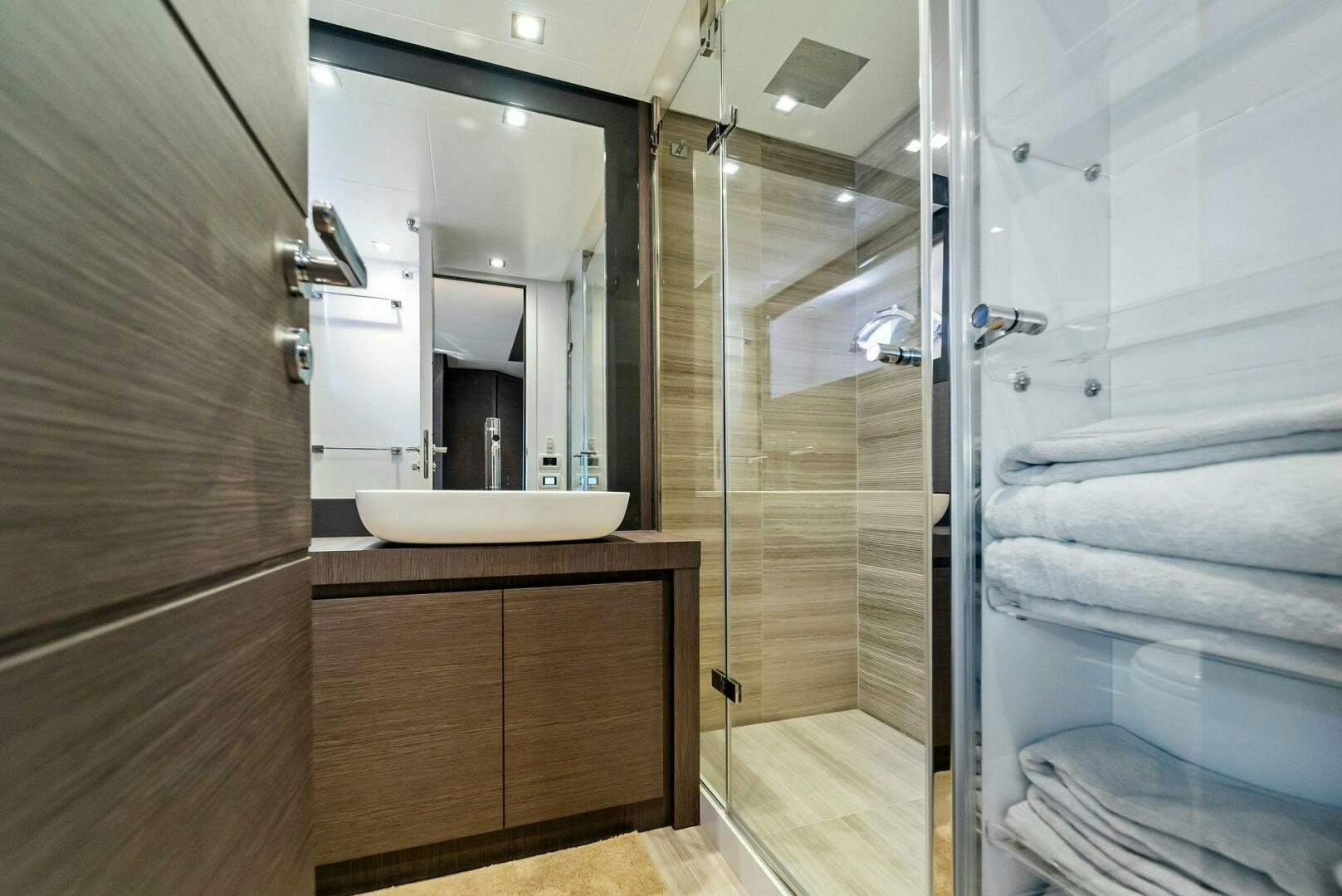 a bathroom with a sink and a mirror aboard G Yacht for Sale