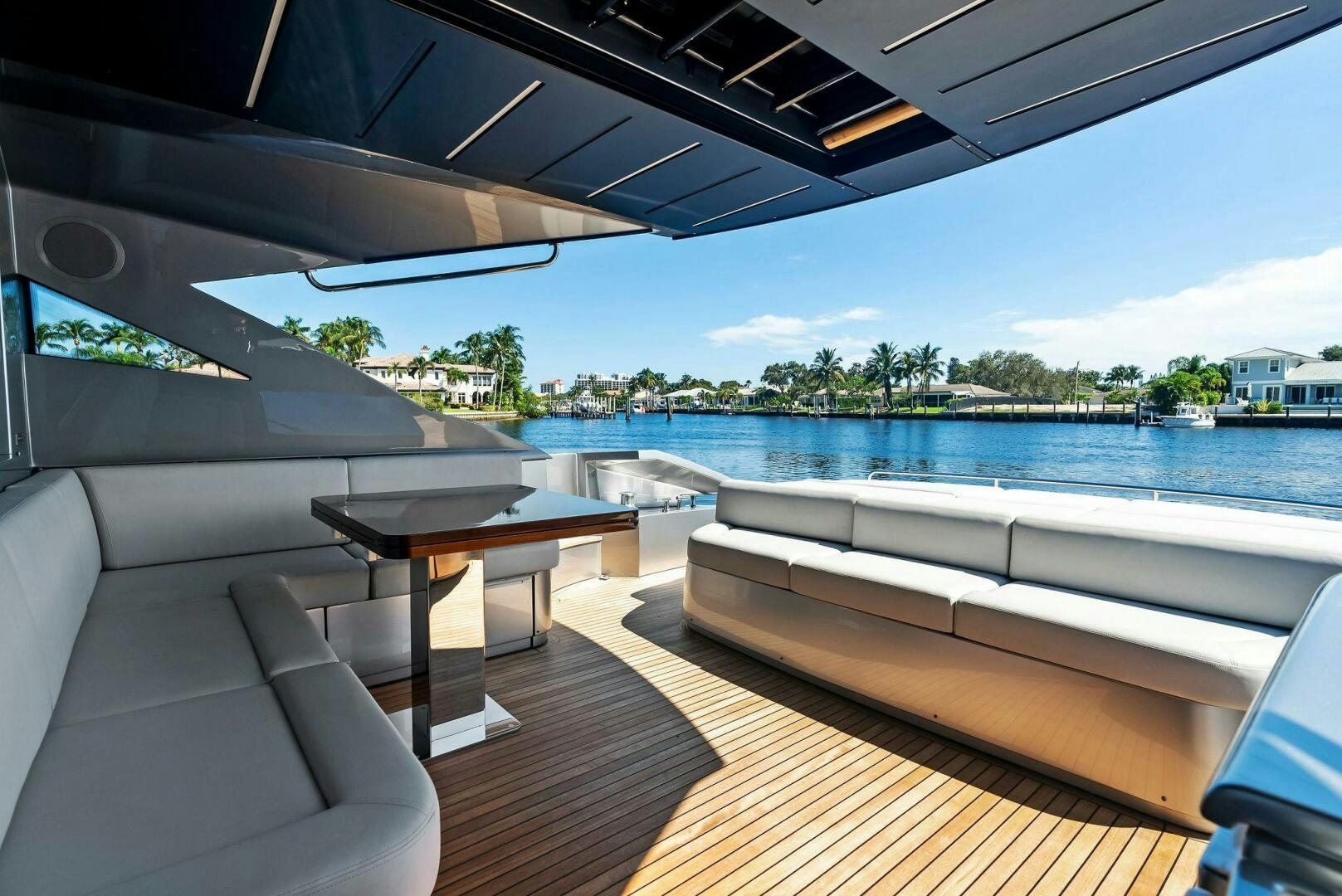 a deck with a pool and a deck with a view of the water aboard G Yacht for Sale