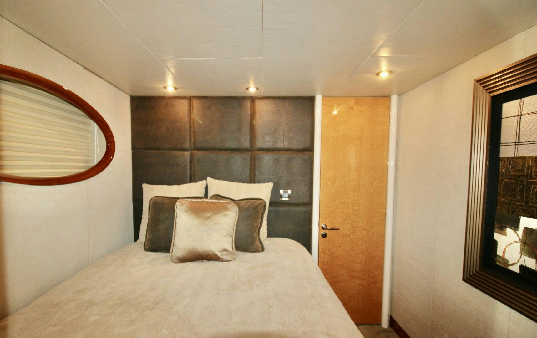 a bed with pillows on it aboard KATHLEEN Yacht for Sale