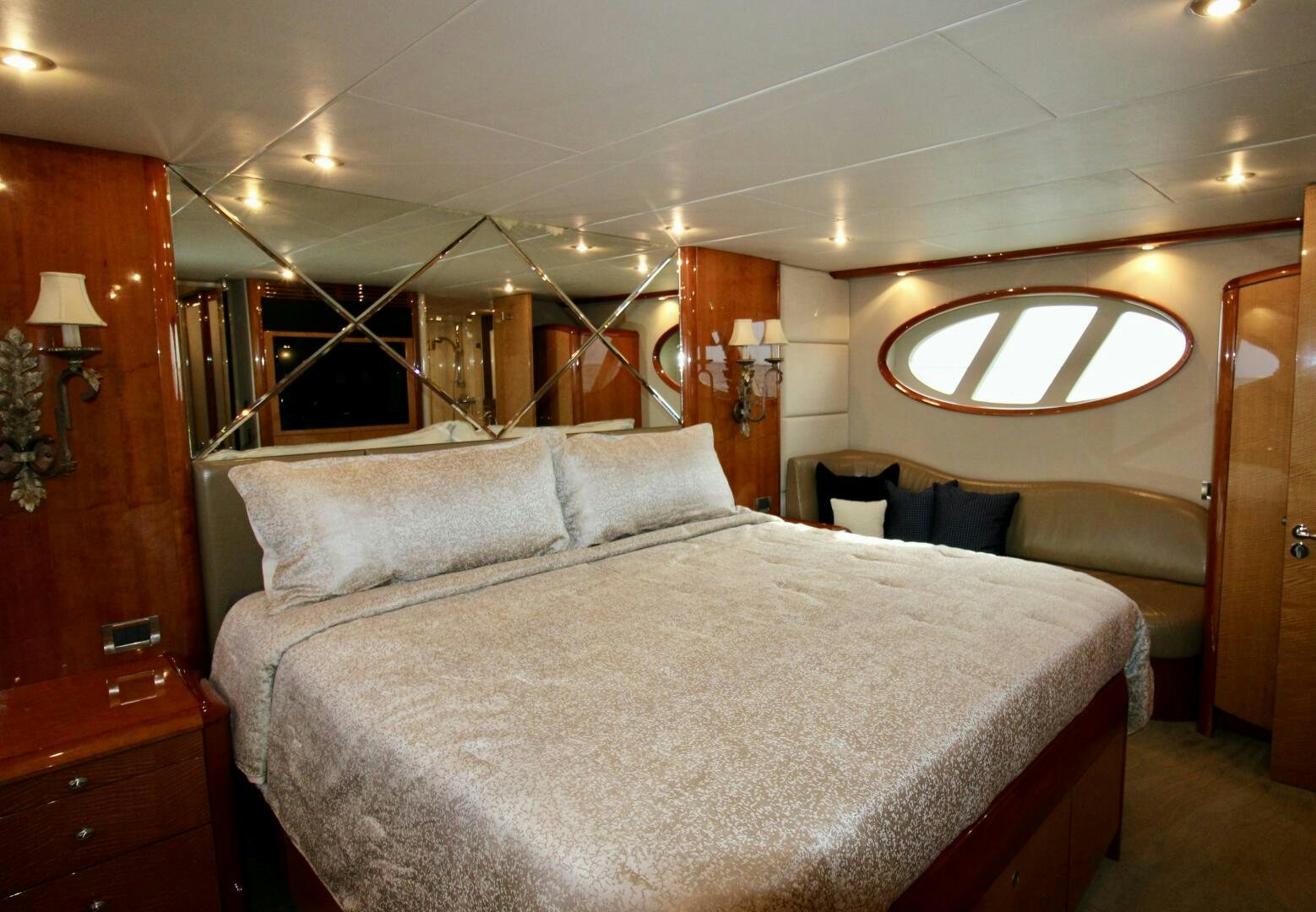 a bed with a white comforter aboard KATHLEEN Yacht for Sale