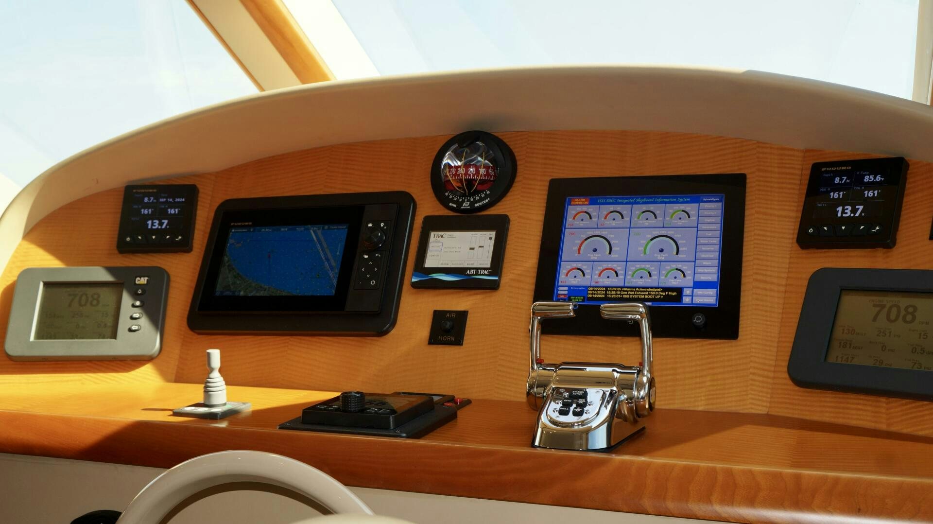 a desk with a computer and other electronic devices on it aboard KATHLEEN Yacht for Sale