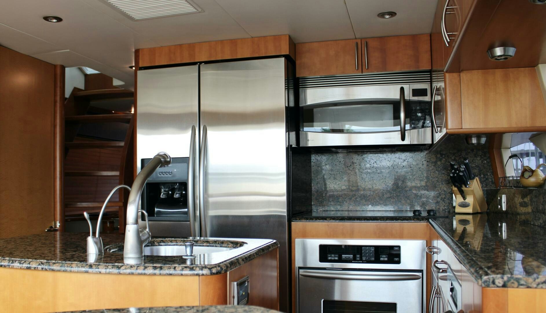 a kitchen with a glass door aboard KATHLEEN Yacht for Sale