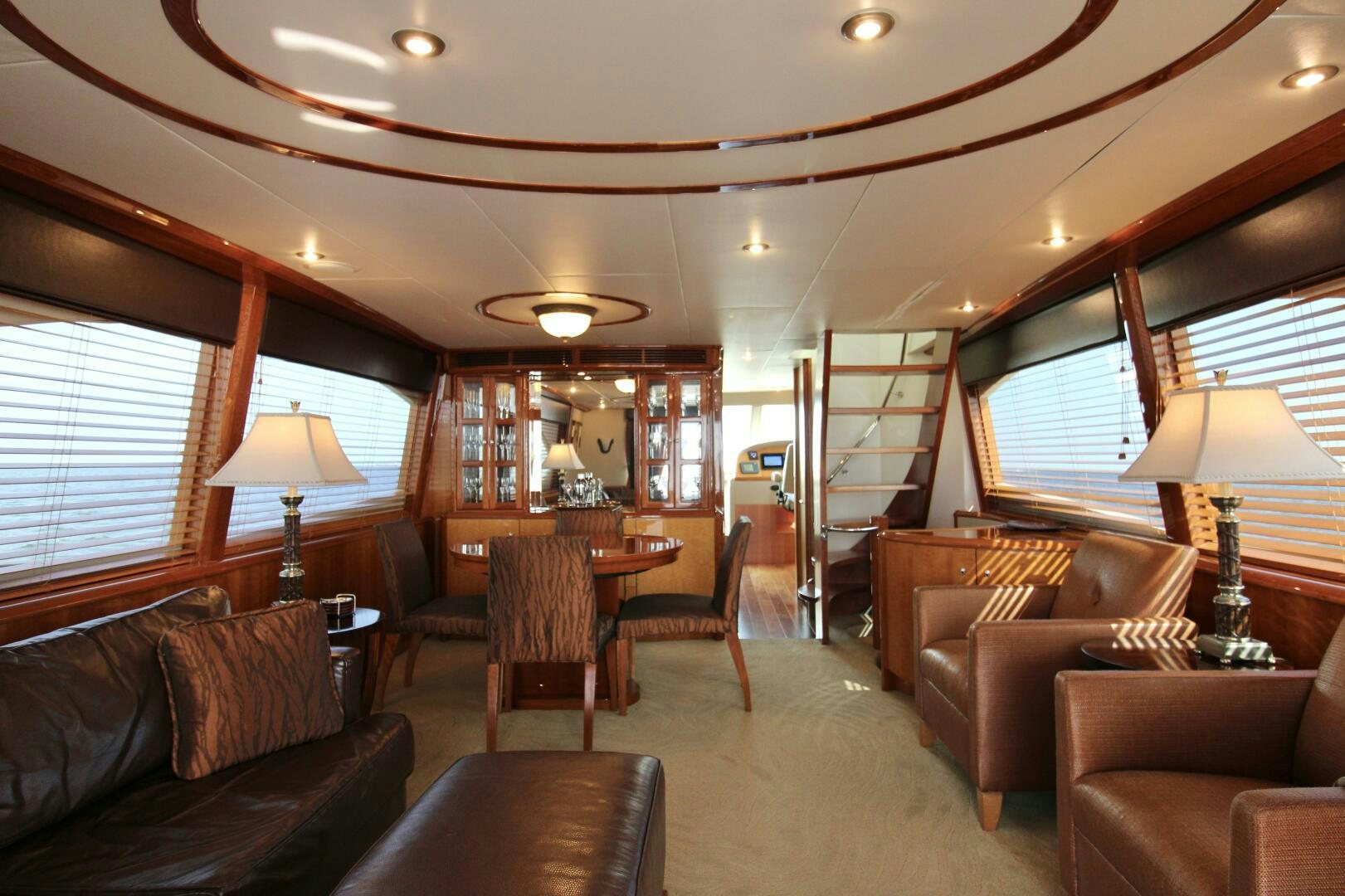 a living room with a large window aboard KATHLEEN Yacht for Sale
