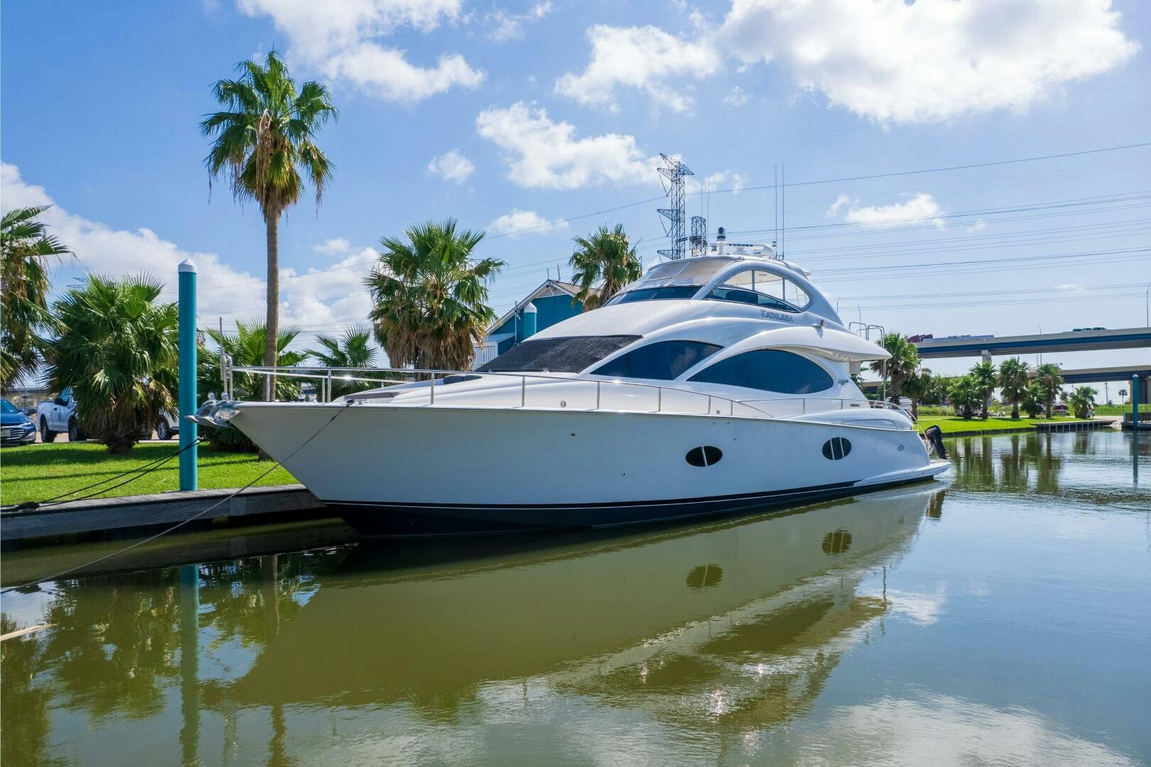 a white boat in a body of water aboard KATHLEEN Yacht for Sale