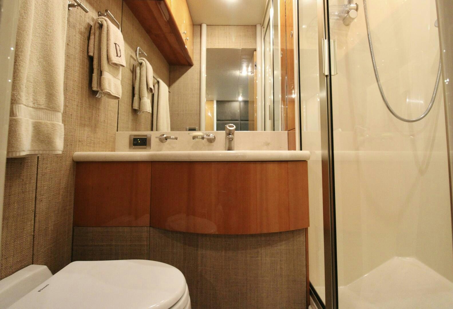 a bathroom with a sink and toilet aboard KATHLEEN Yacht for Sale