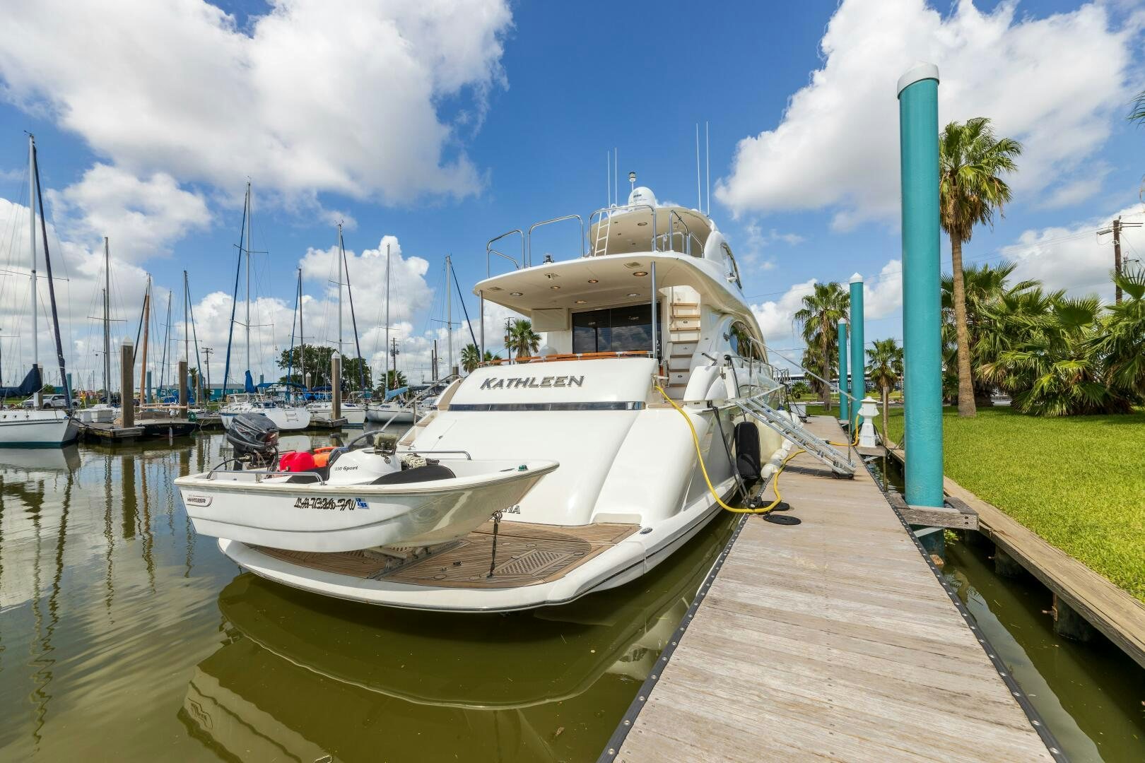 a boat docked at a dock aboard KATHLEEN Yacht for Sale