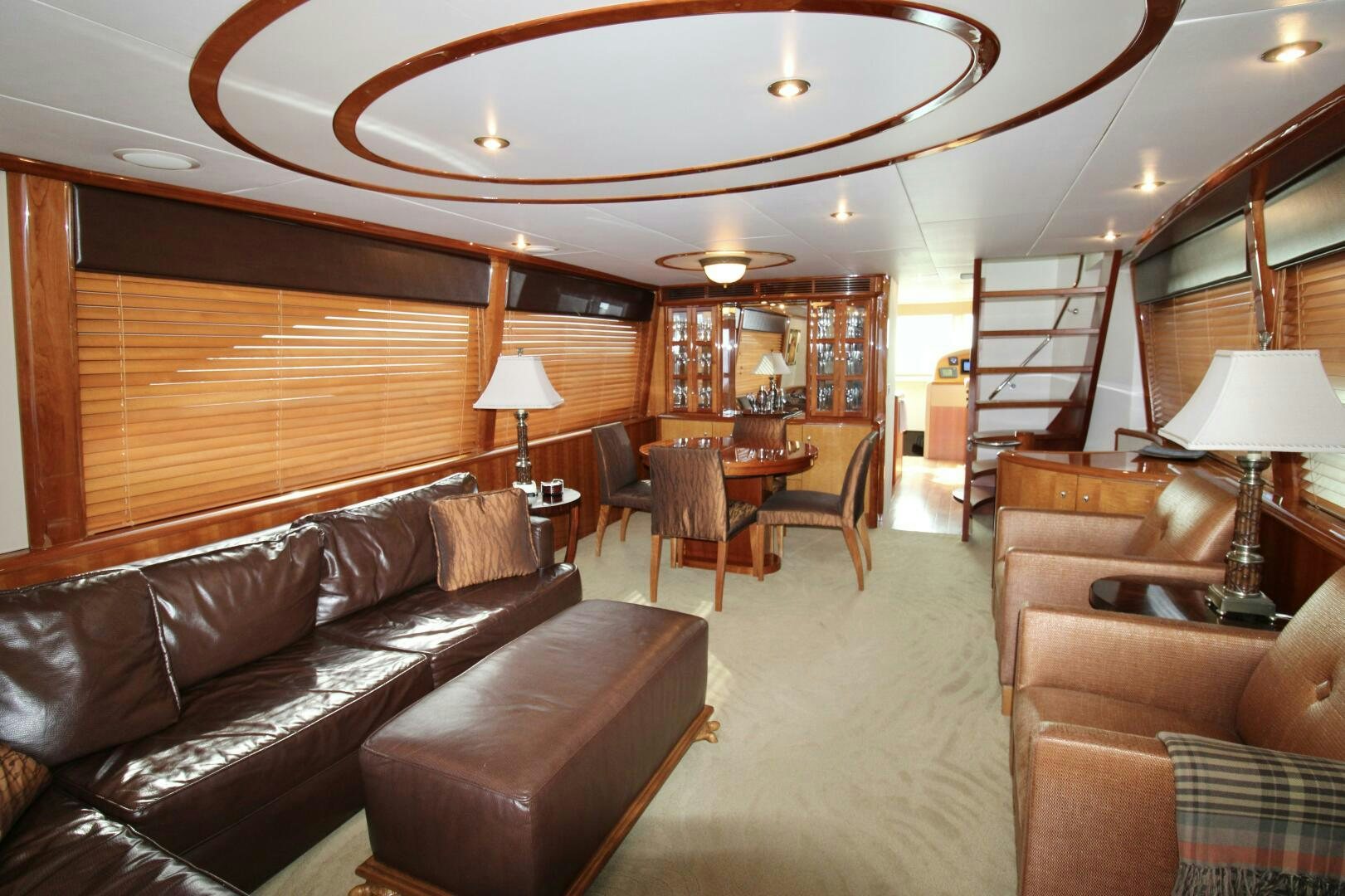 a living room with leather couches aboard KATHLEEN Yacht for Sale