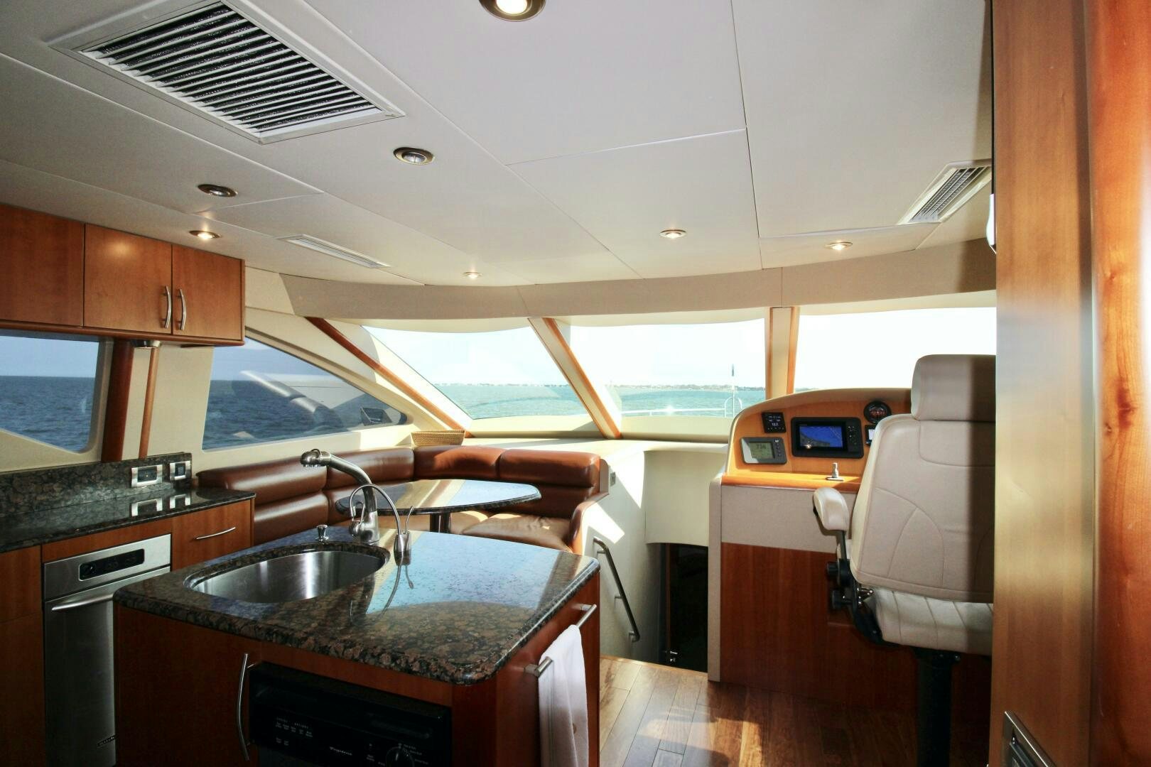 a kitchen with a sink and a microwave aboard KATHLEEN Yacht for Sale