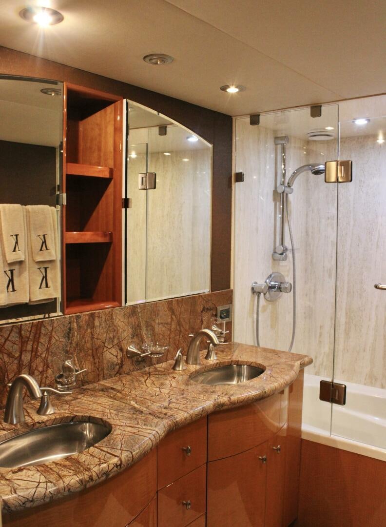 a bathroom with a sink and a shower aboard KATHLEEN Yacht for Sale