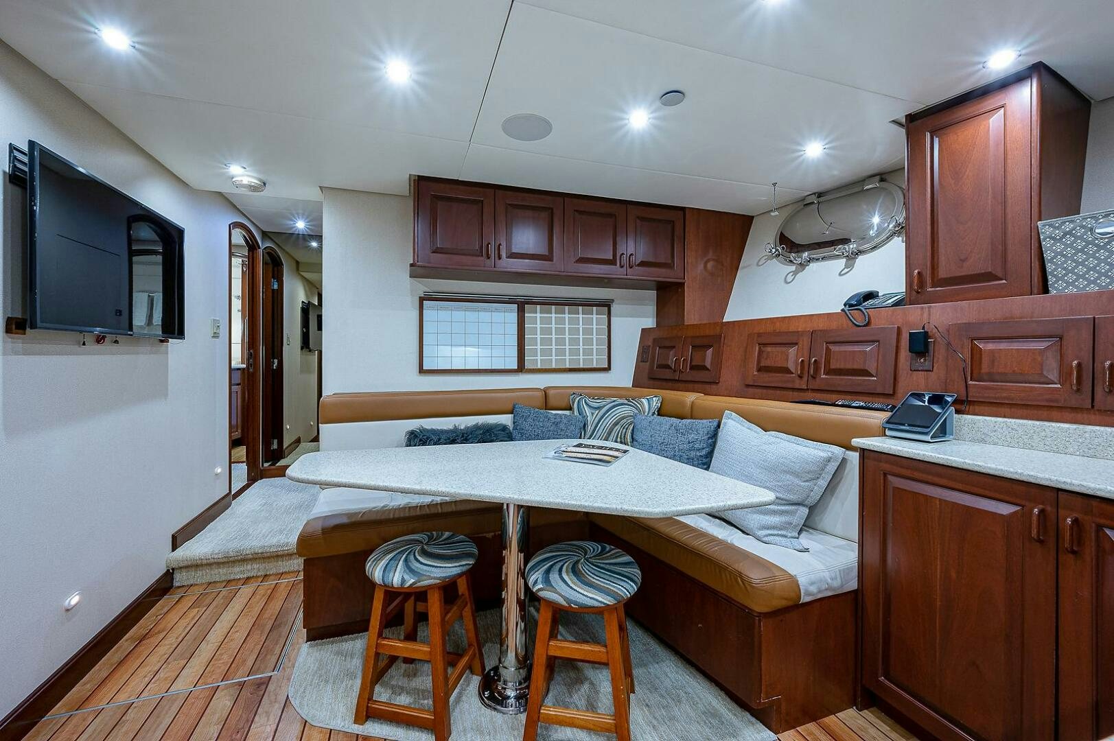 a large kitchen with a large table aboard LA SIRENA Yacht for Sale