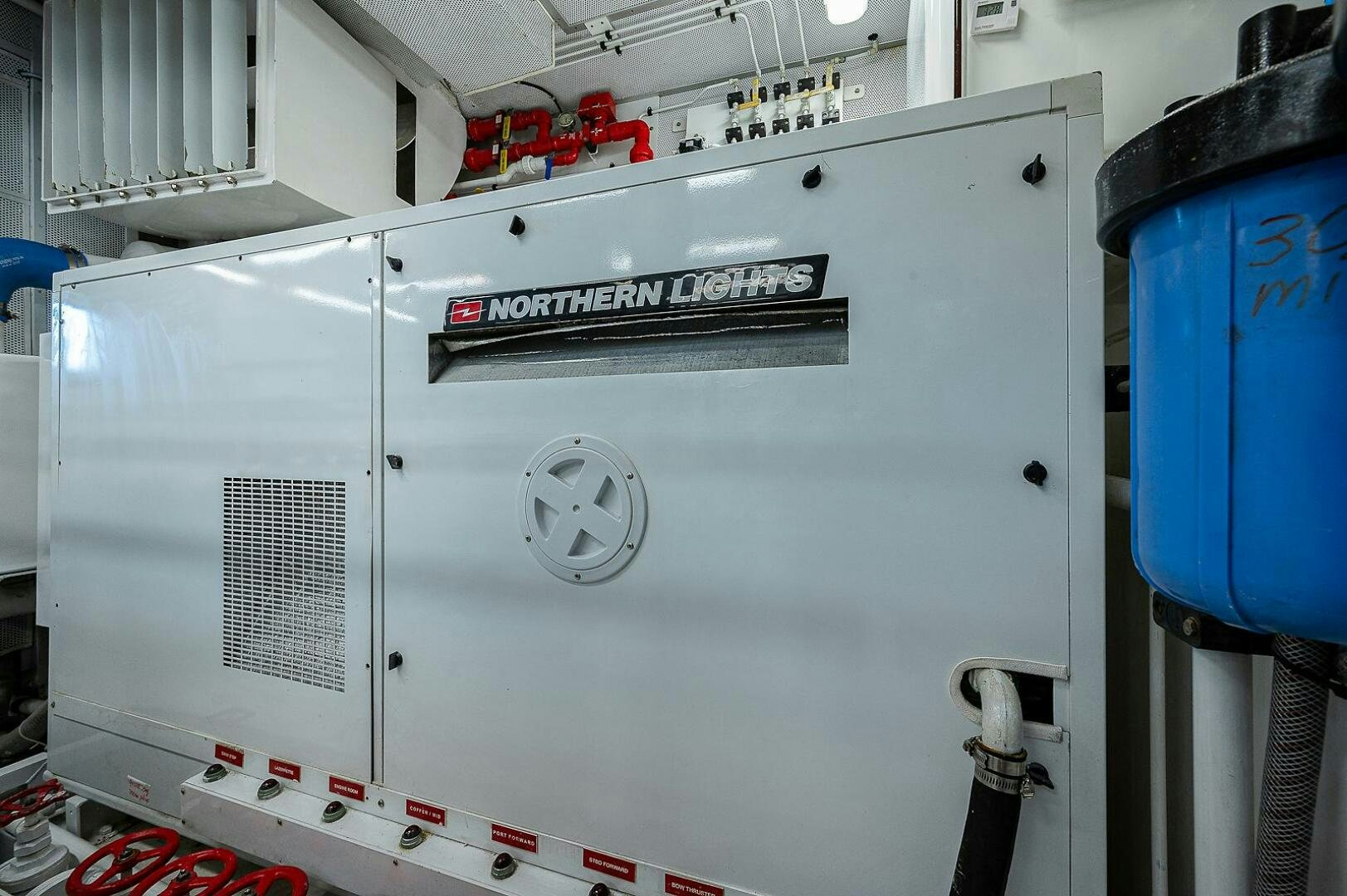 a white machine with red buttons aboard LA SIRENA Yacht for Sale