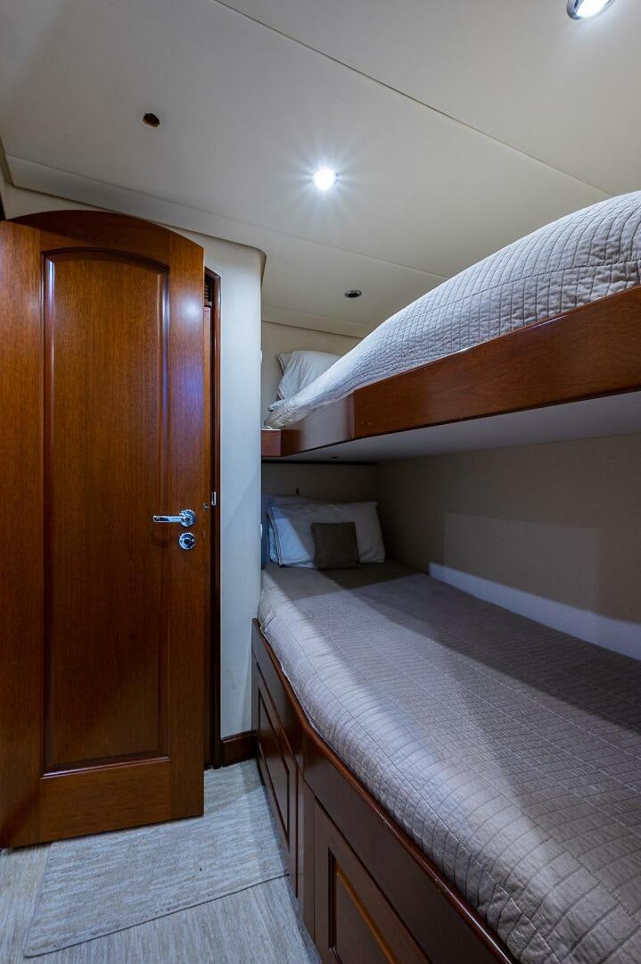 a room with two beds aboard LA SIRENA Yacht for Sale