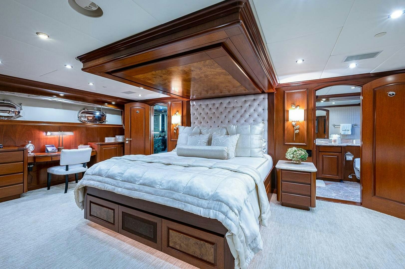 a large bedroom with a large bed aboard LA SIRENA Yacht for Sale