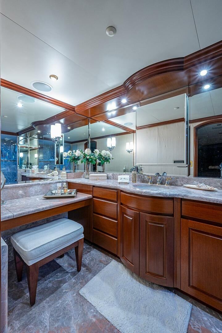a bathroom with a large mirror aboard LA SIRENA Yacht for Sale