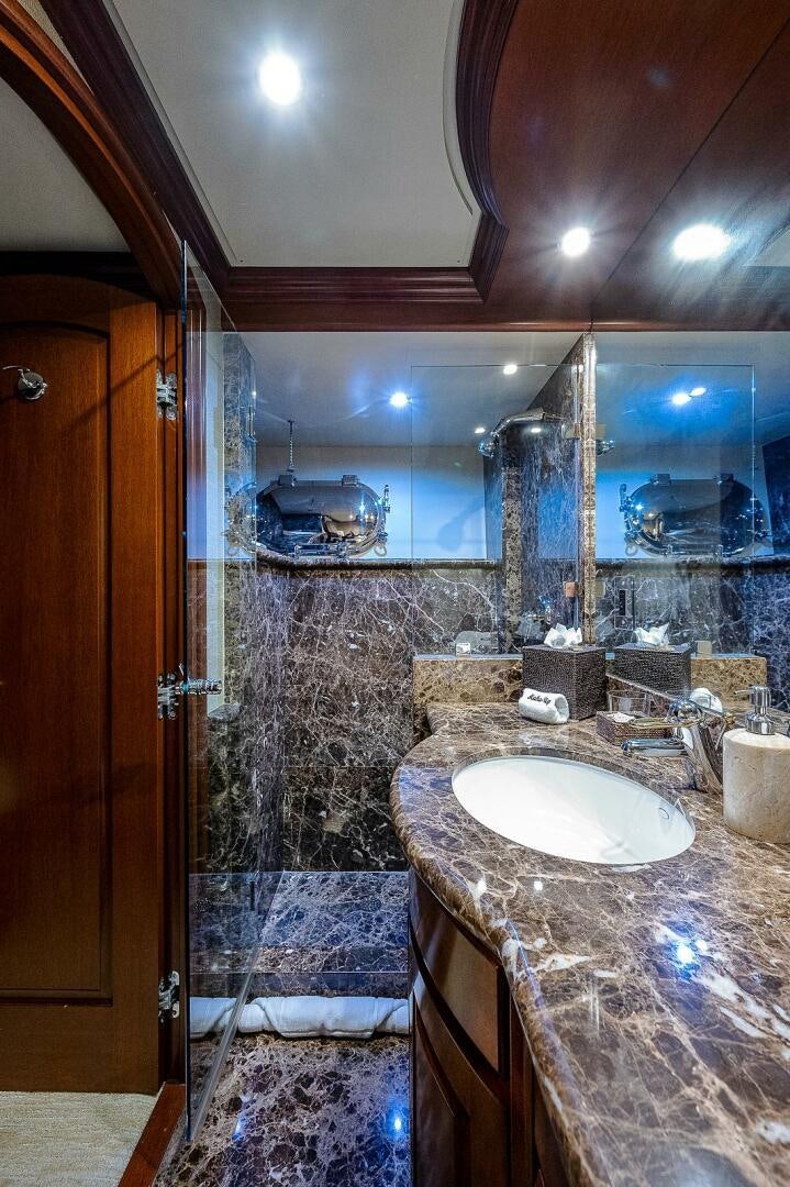 a bathroom with a marble counter top aboard LA SIRENA Yacht for Sale