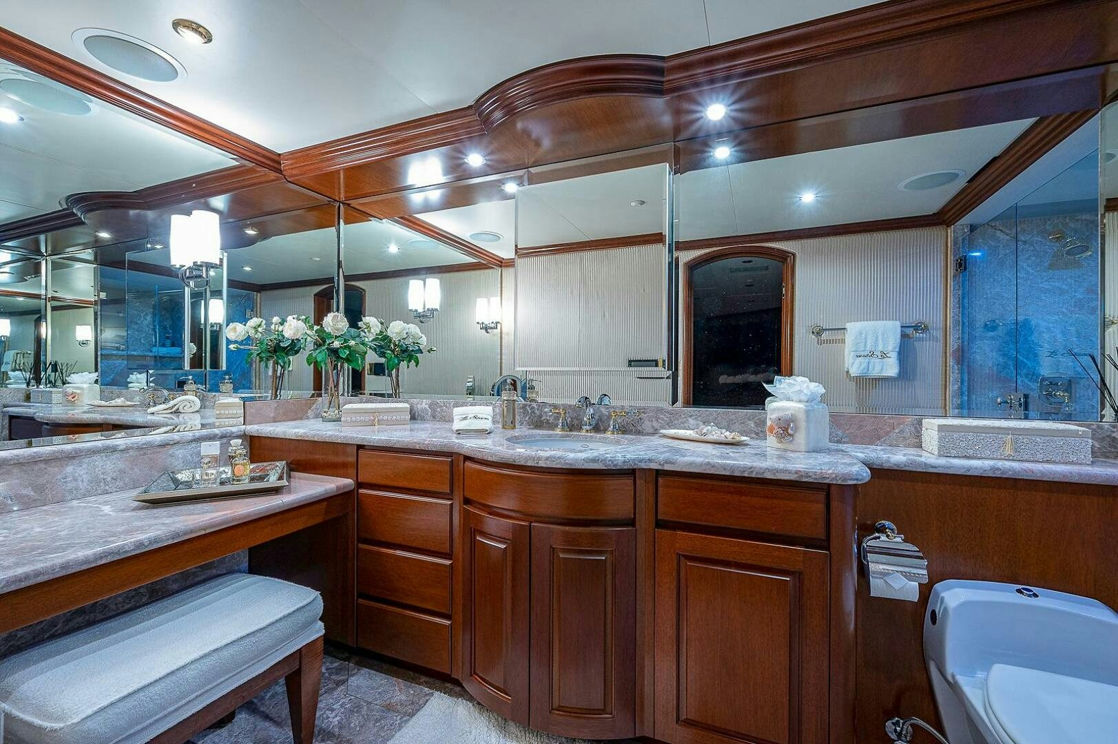 a bathroom with a large mirror aboard LA SIRENA Yacht for Sale