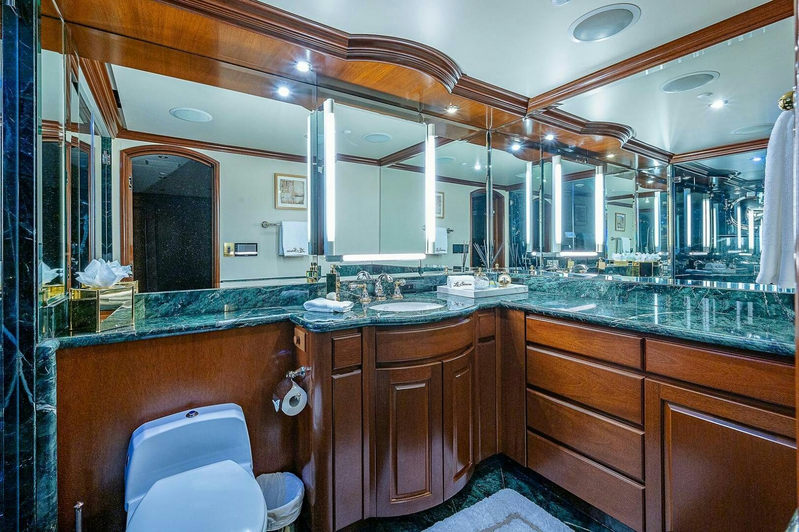 a bathroom with a large mirror aboard LA SIRENA Yacht for Sale