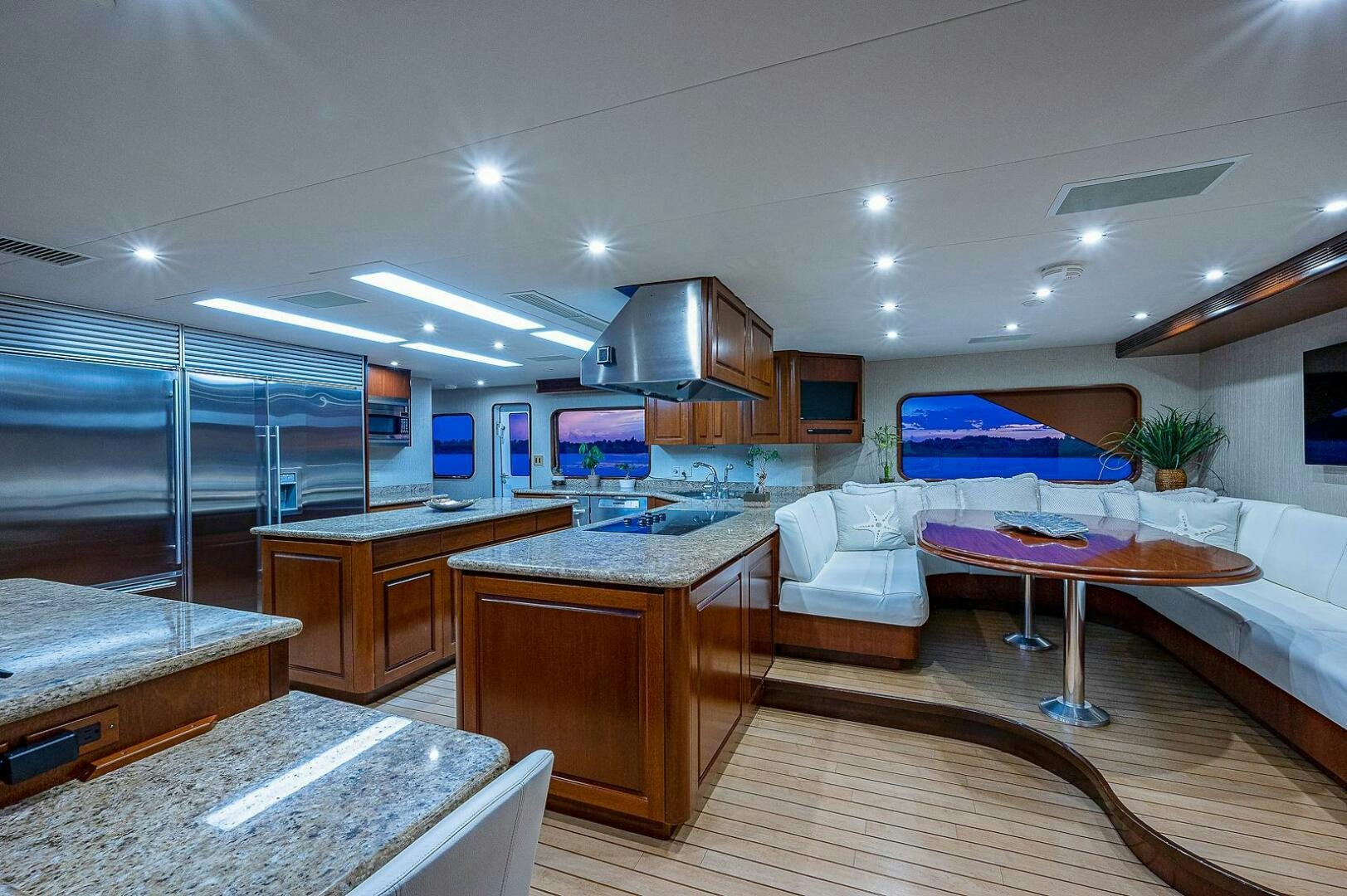 a kitchen and living room aboard LA SIRENA Yacht for Sale
