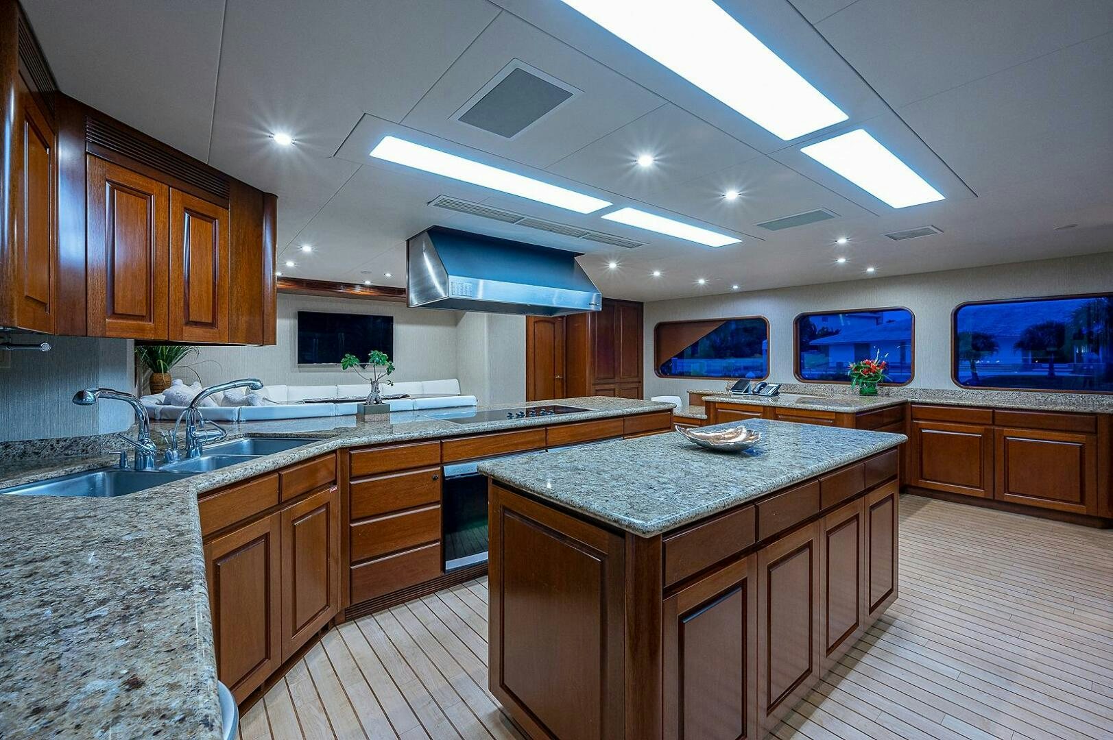 a kitchen with a large island aboard LA SIRENA Yacht for Sale