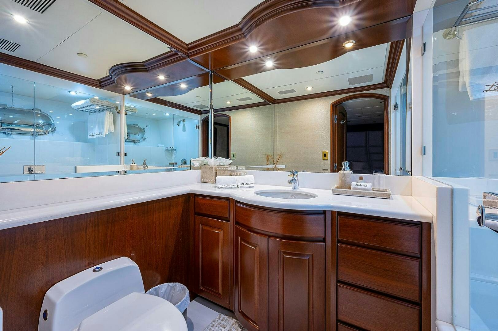 a bathroom with a large mirror aboard LA SIRENA Yacht for Sale