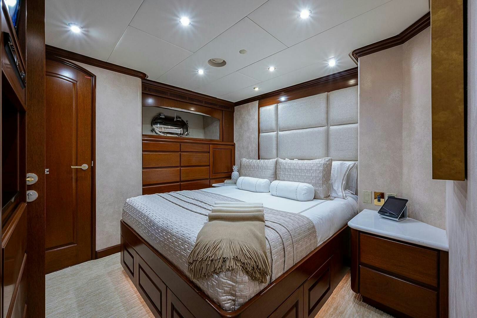 a bed in a room aboard LA SIRENA Yacht for Sale