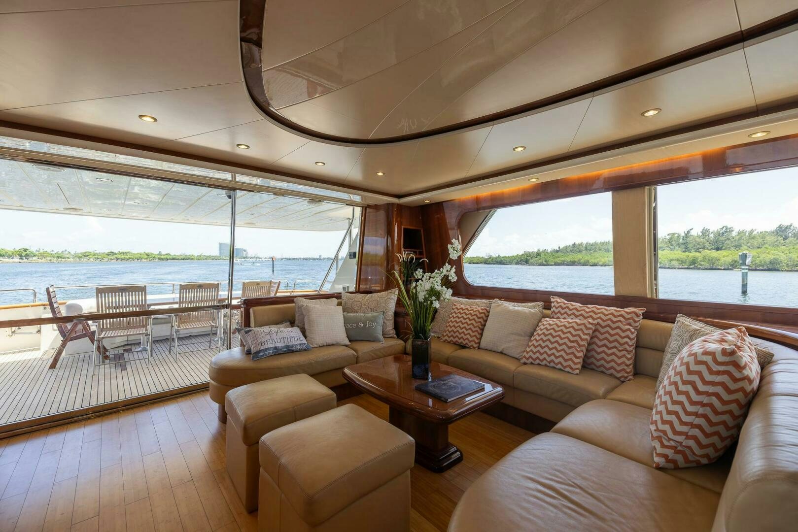 a living room with a large window aboard ONE MORE TIME Yacht for Sale