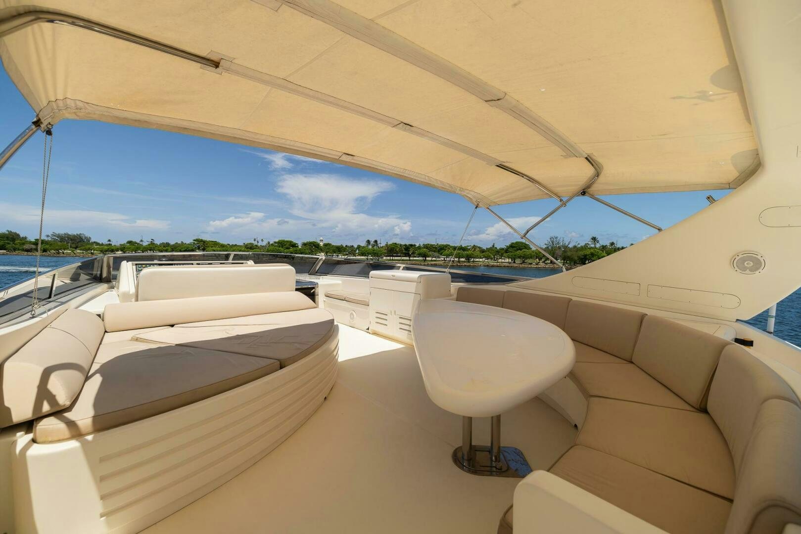 a room with a view of the water and the land below aboard ONE MORE TIME Yacht for Sale