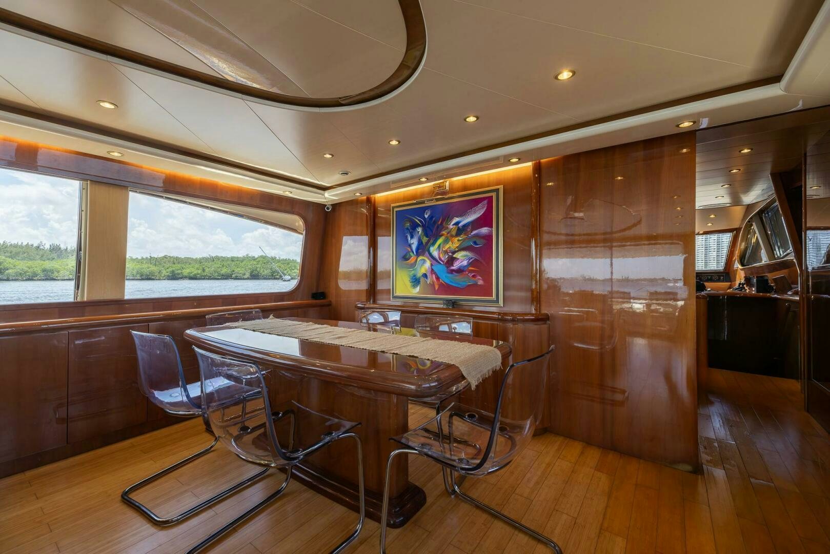 a room with a table and chairs aboard ONE MORE TIME Yacht for Sale