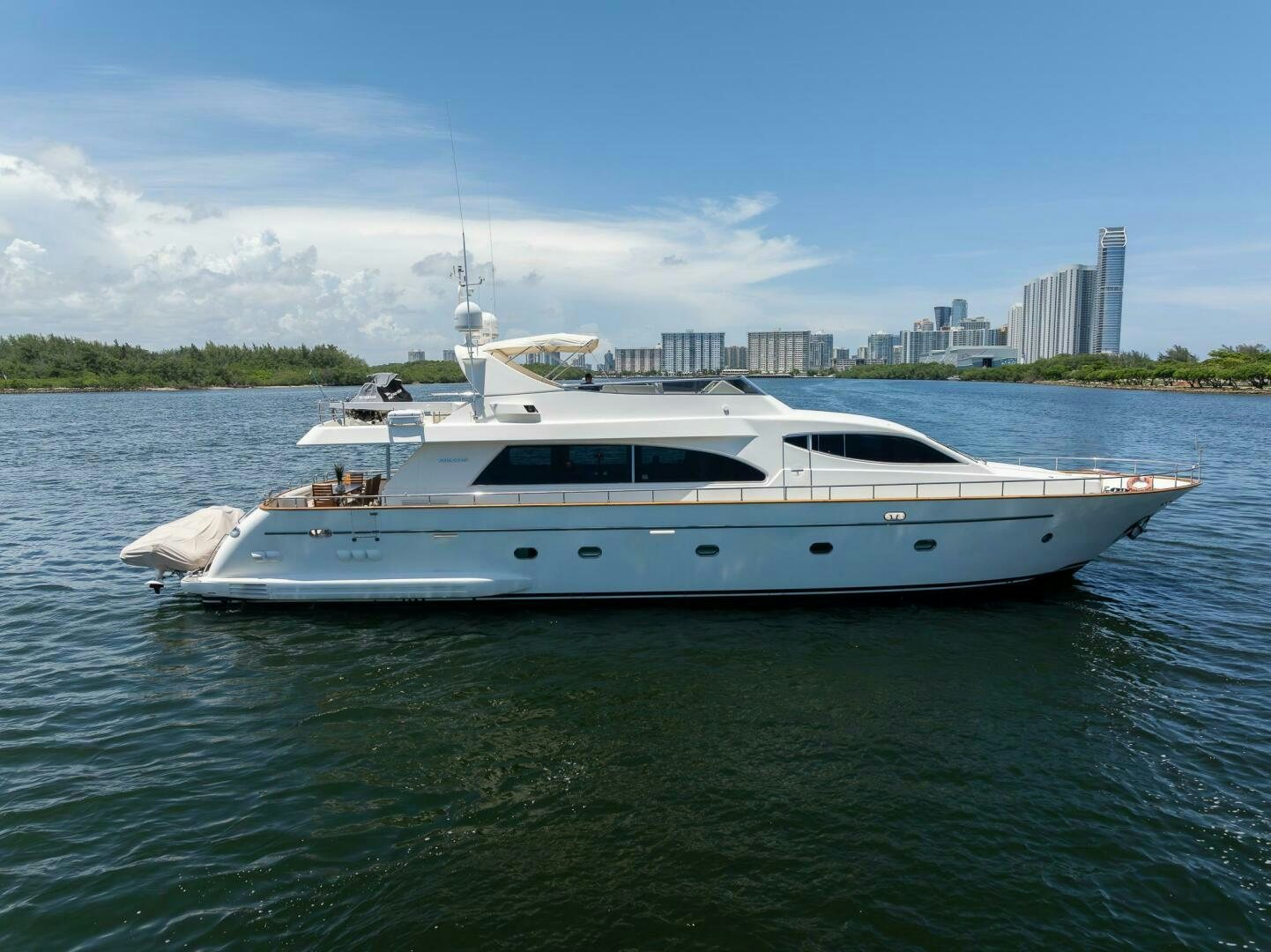 a white yacht in the water aboard ONE MORE TIME Yacht for Sale