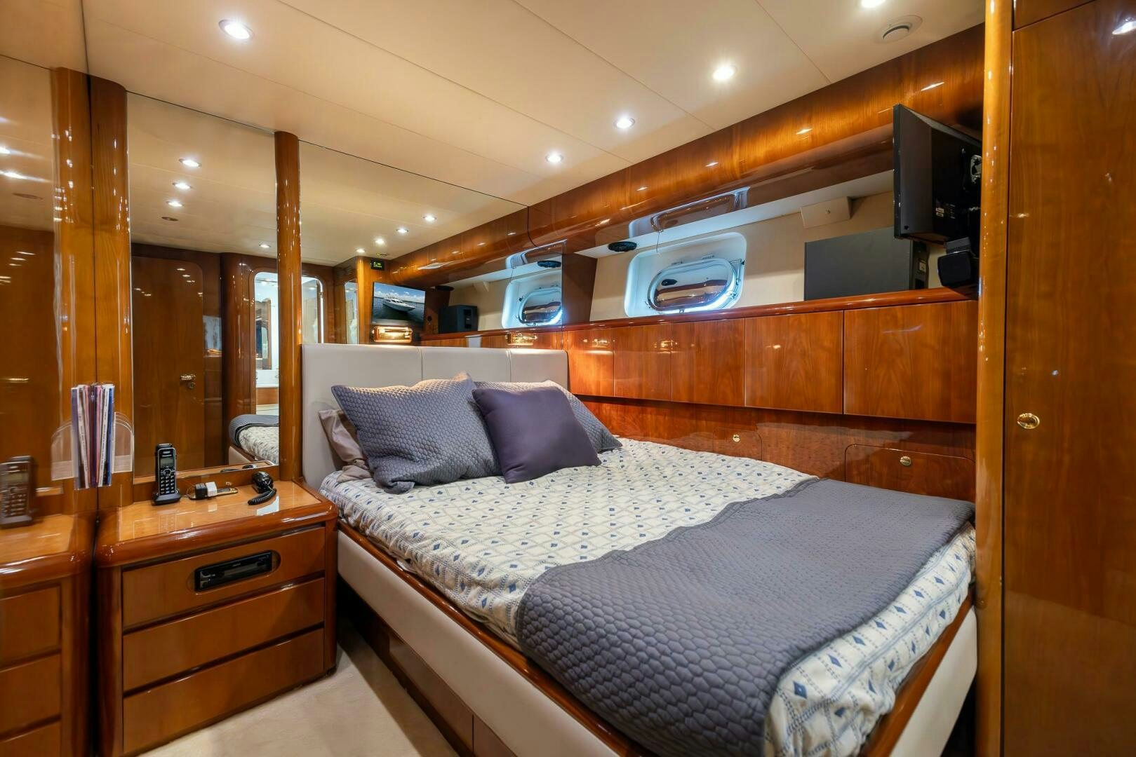 a bed in a room aboard ONE MORE TIME Yacht for Sale