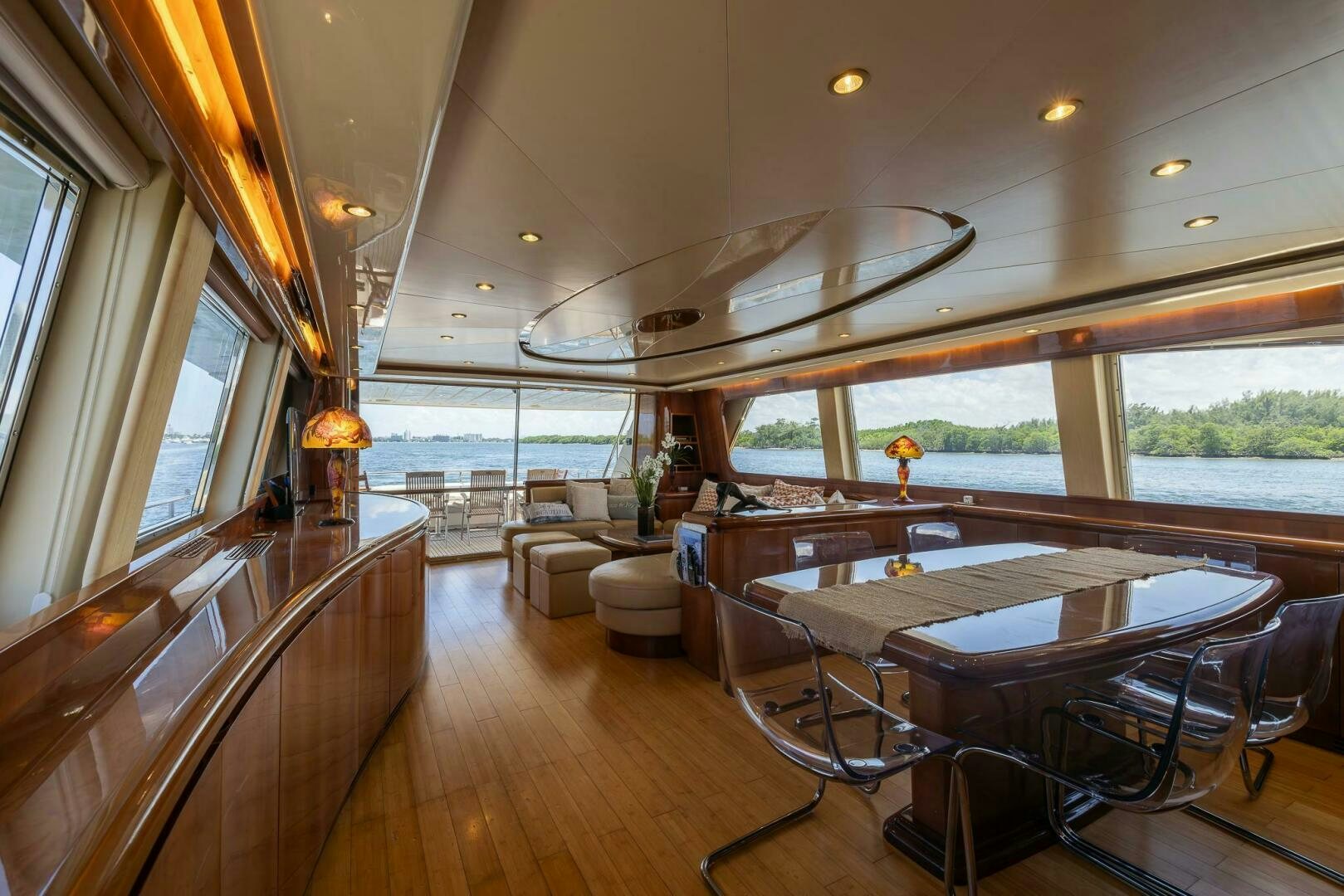 a large room with a table and chairs aboard ONE MORE TIME Yacht for Sale