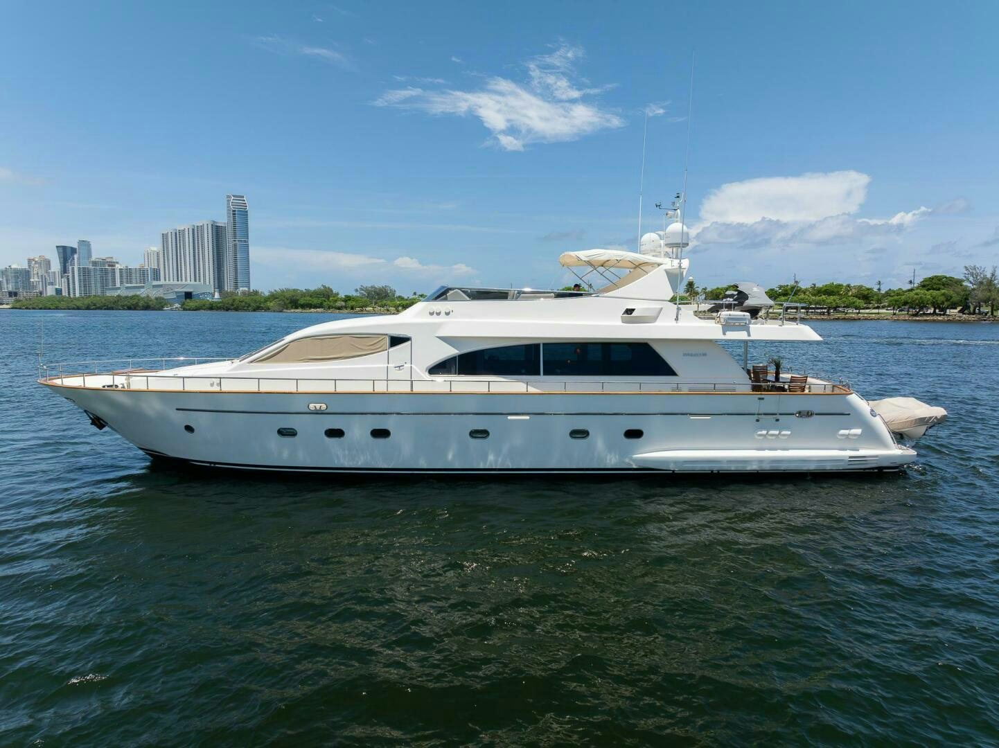 a white yacht in the water aboard ONE MORE TIME Yacht for Sale