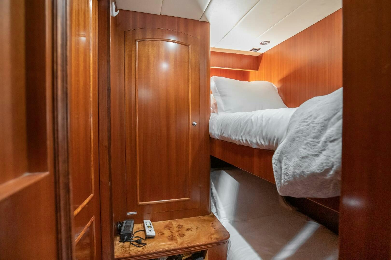 a bed in a room aboard KENTUCKY BELLE Yacht for Sale