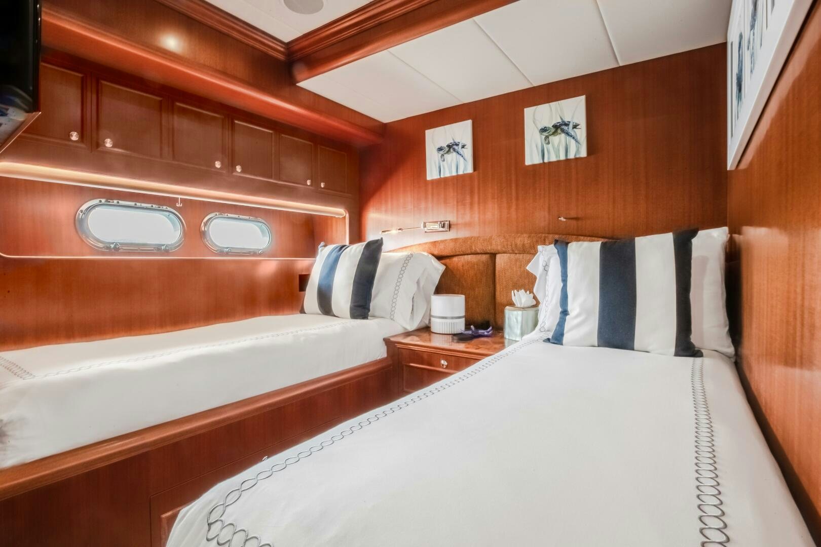 a bed with white sheets aboard KENTUCKY BELLE Yacht for Sale