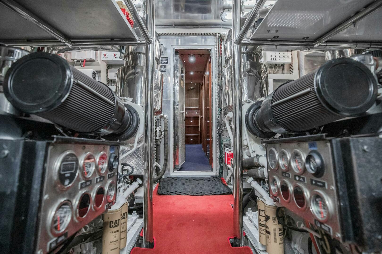 a room with a red carpet and a red carpet aboard KENTUCKY BELLE Yacht for Sale