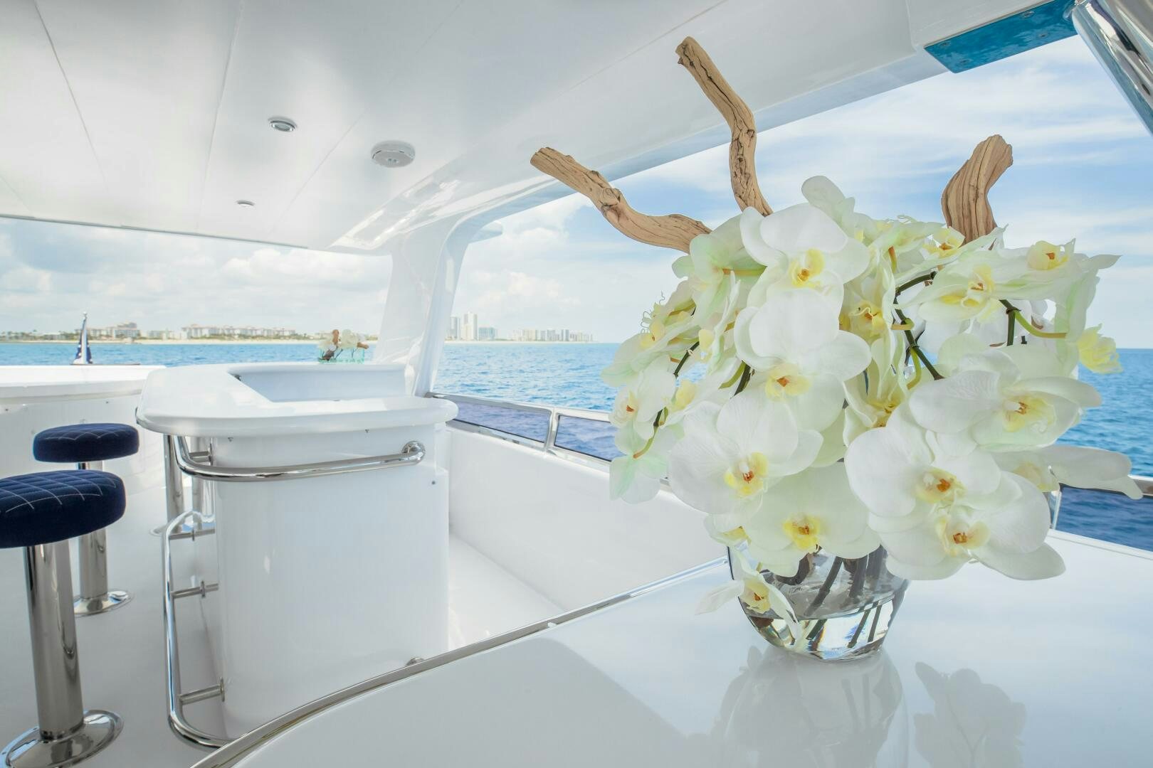 a vase of white flowers aboard KENTUCKY BELLE Yacht for Sale