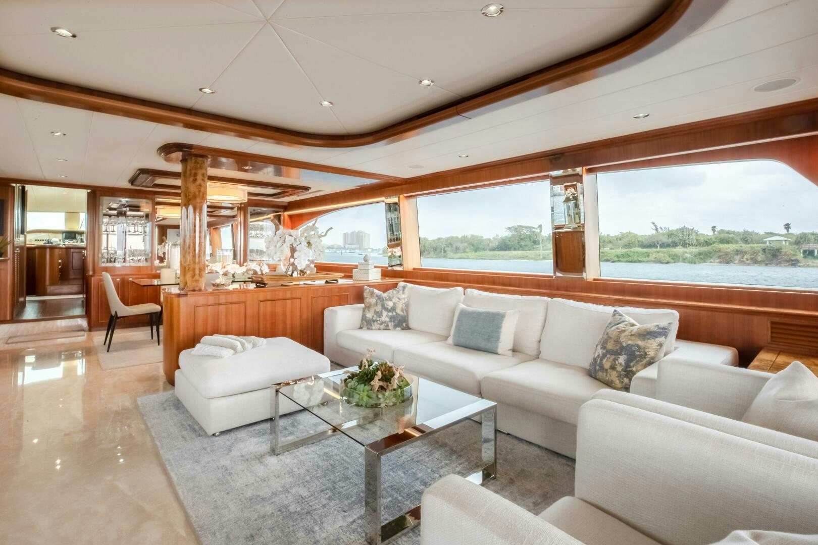 a living room with a large window aboard KENTUCKY BELLE Yacht for Sale