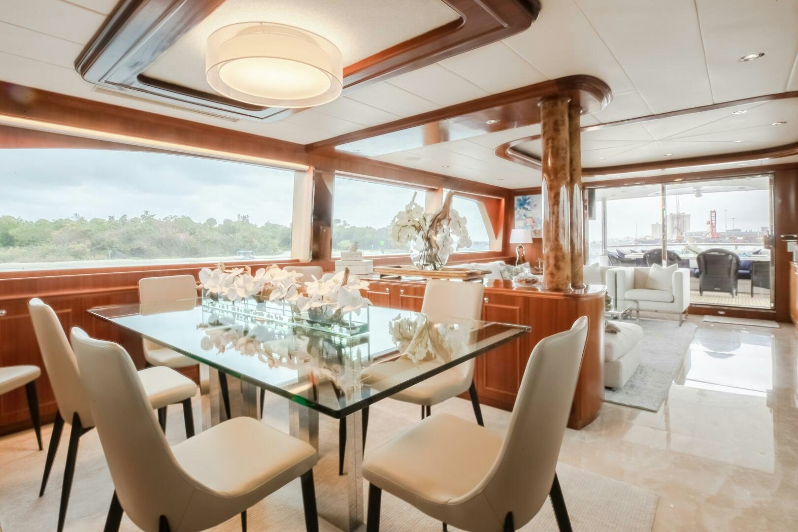 a dining room with a table and chairs aboard KENTUCKY BELLE Yacht for Sale