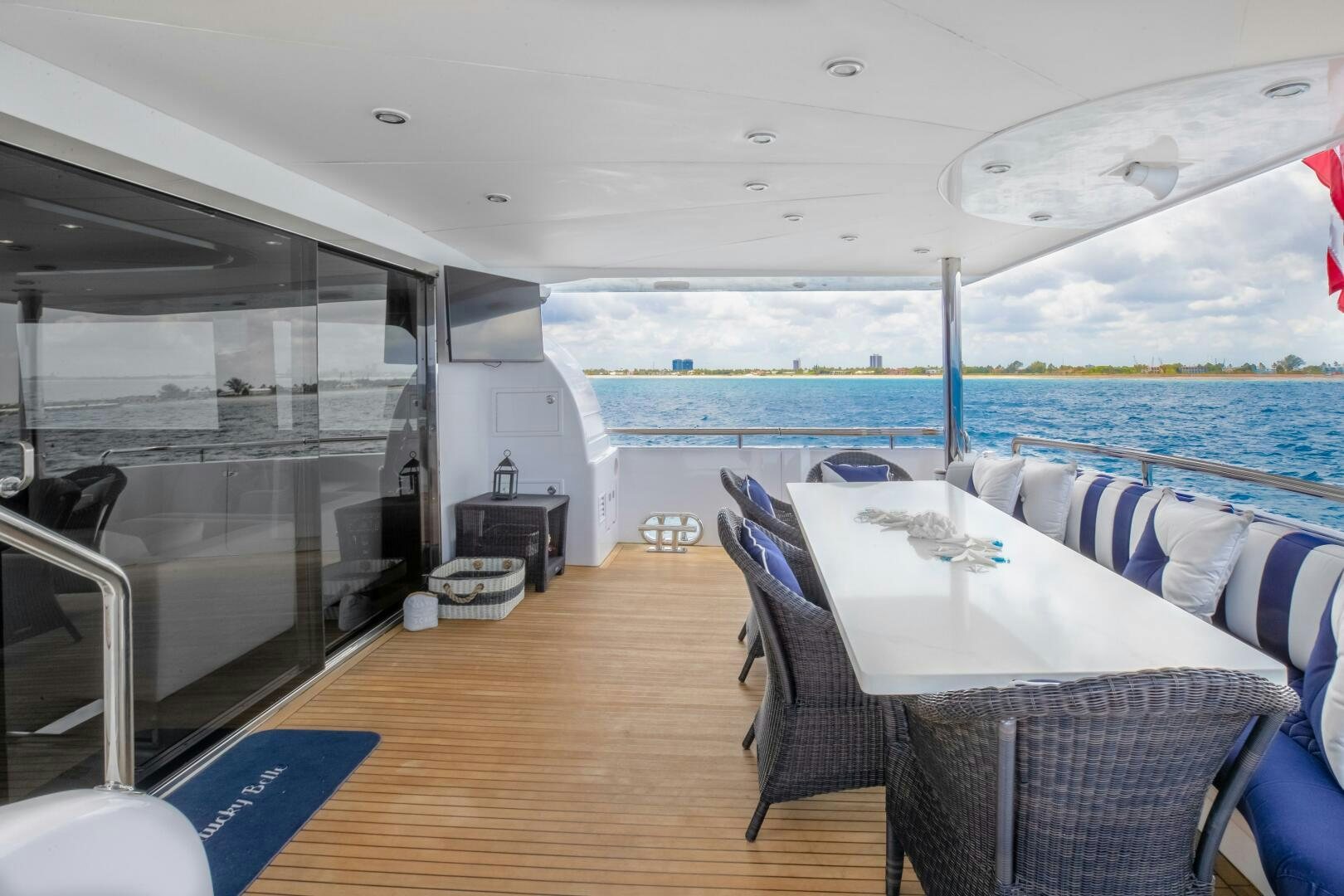 a boat with a table and chairs aboard KENTUCKY BELLE Yacht for Sale