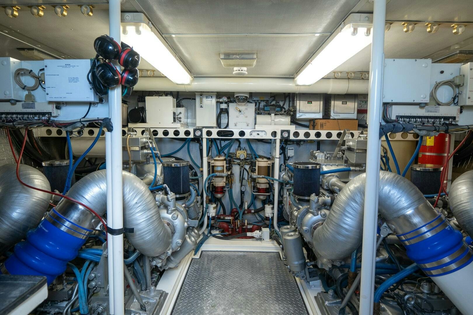 a room with pipes and tubes aboard PRESTIGE WORLDWIDE Yacht for Sale