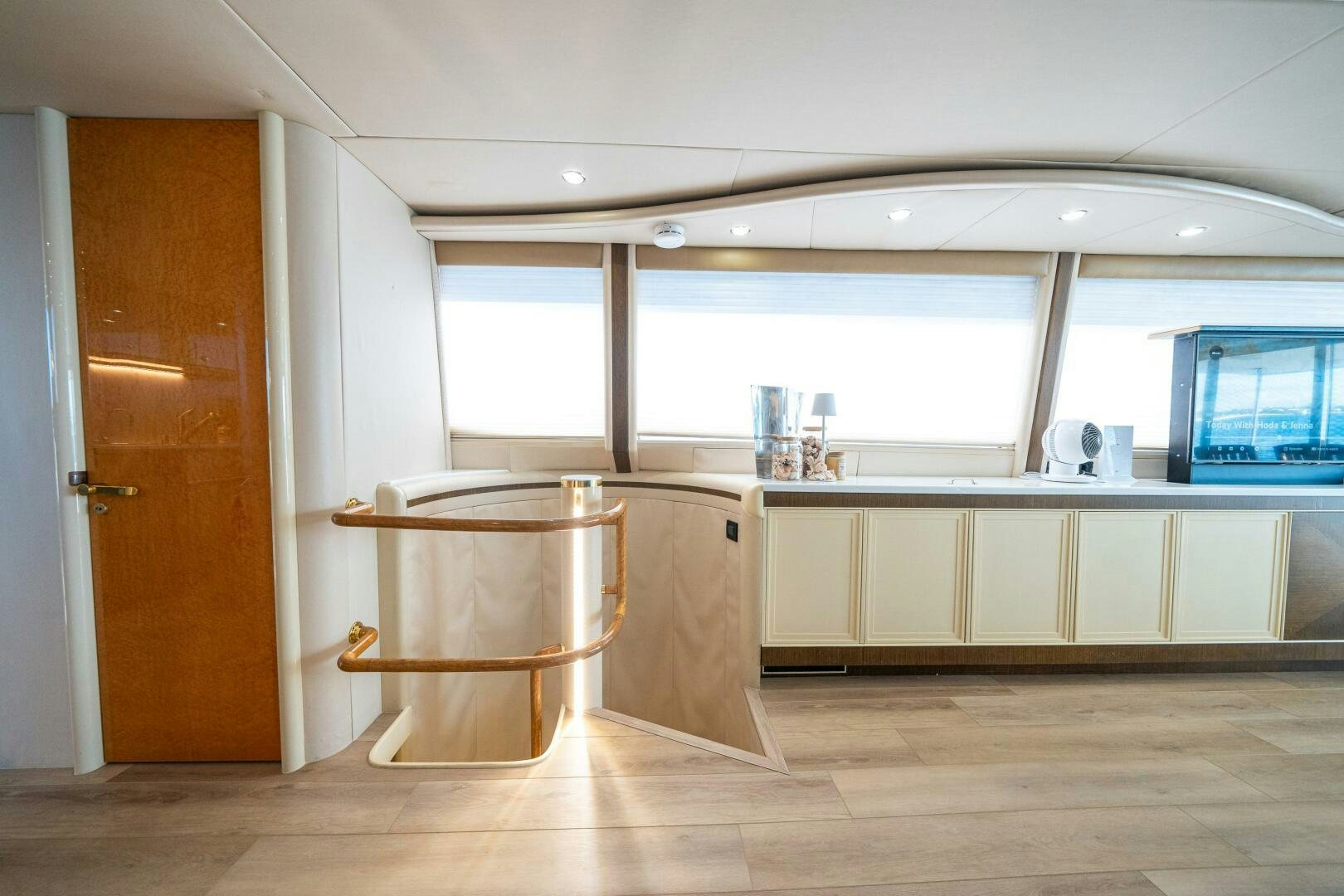 a kitchen with a sink and cabinets aboard PRESTIGE WORLDWIDE Yacht for Sale