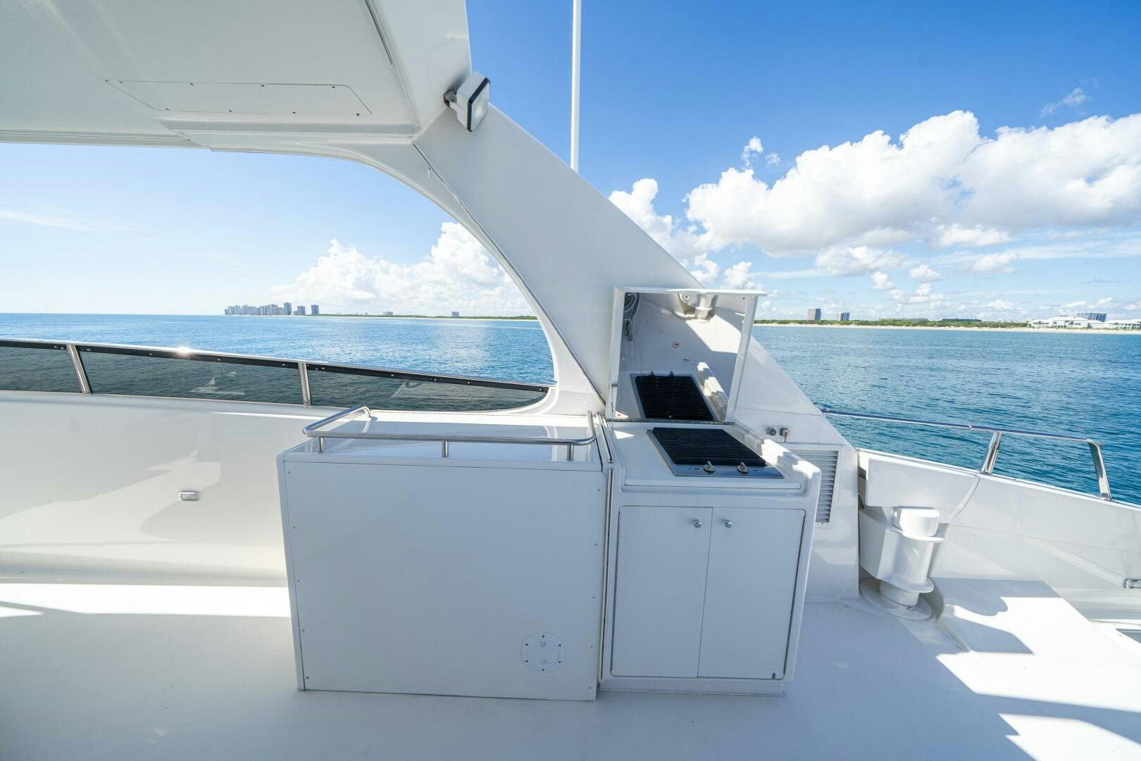 a boat on the water aboard PRESTIGE WORLDWIDE Yacht for Sale