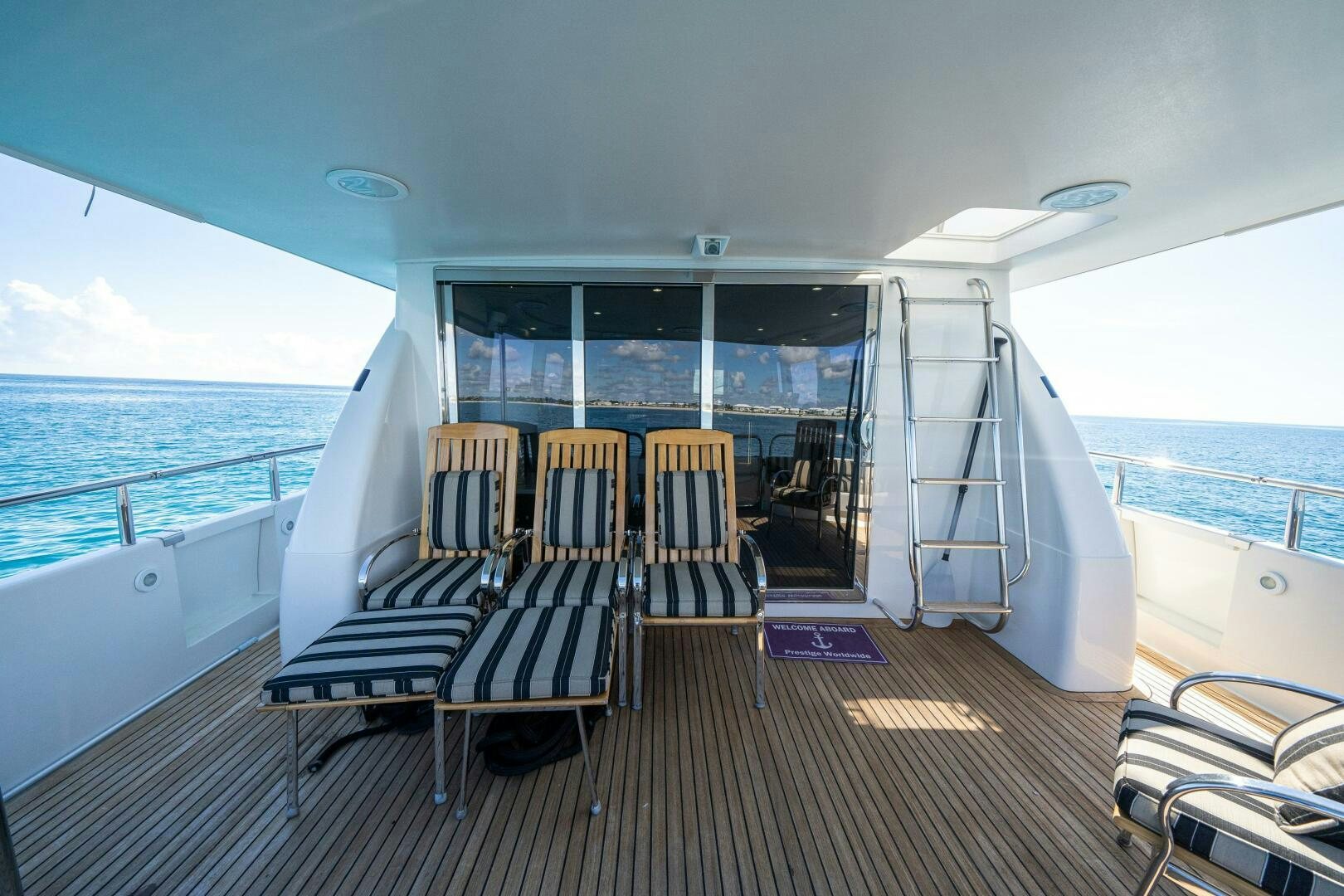 a boat on the water aboard PRESTIGE WORLDWIDE Yacht for Sale