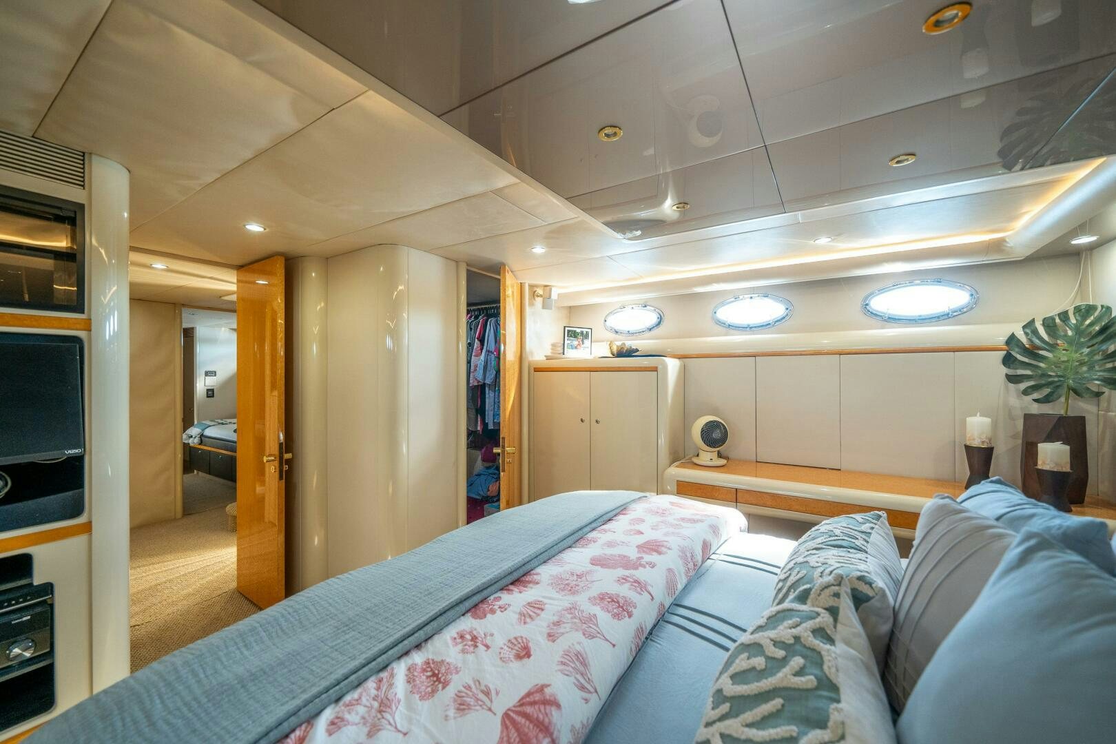 a bedroom with a bed aboard PRESTIGE WORLDWIDE Yacht for Sale