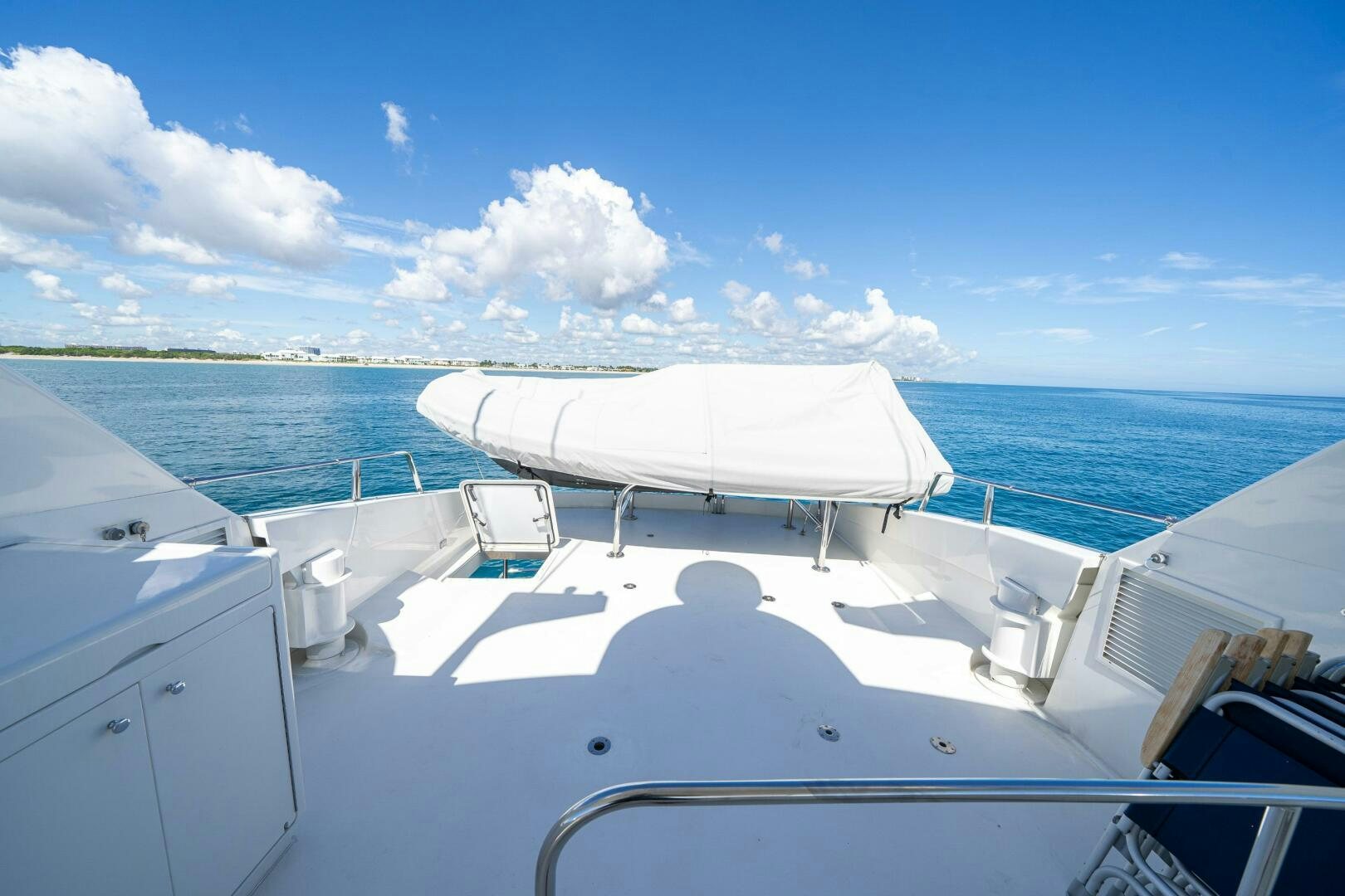 a boat on the water aboard PRESTIGE WORLDWIDE Yacht for Sale