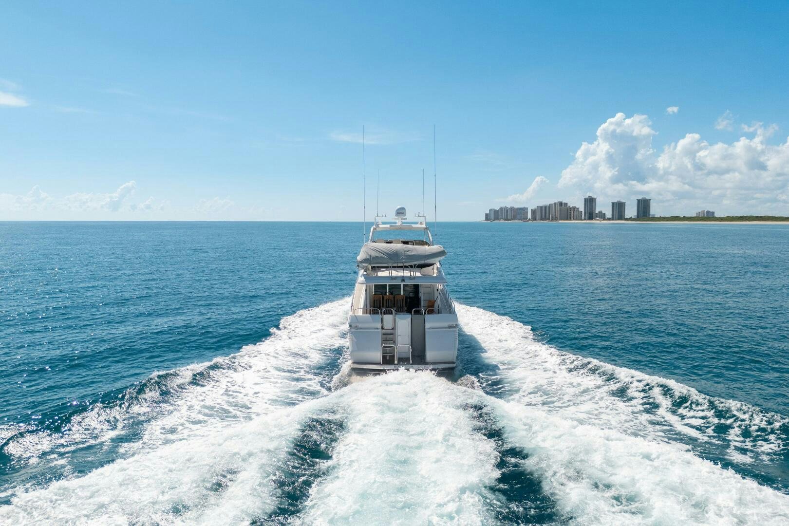 a boat in the water aboard PRESTIGE WORLDWIDE Yacht for Sale