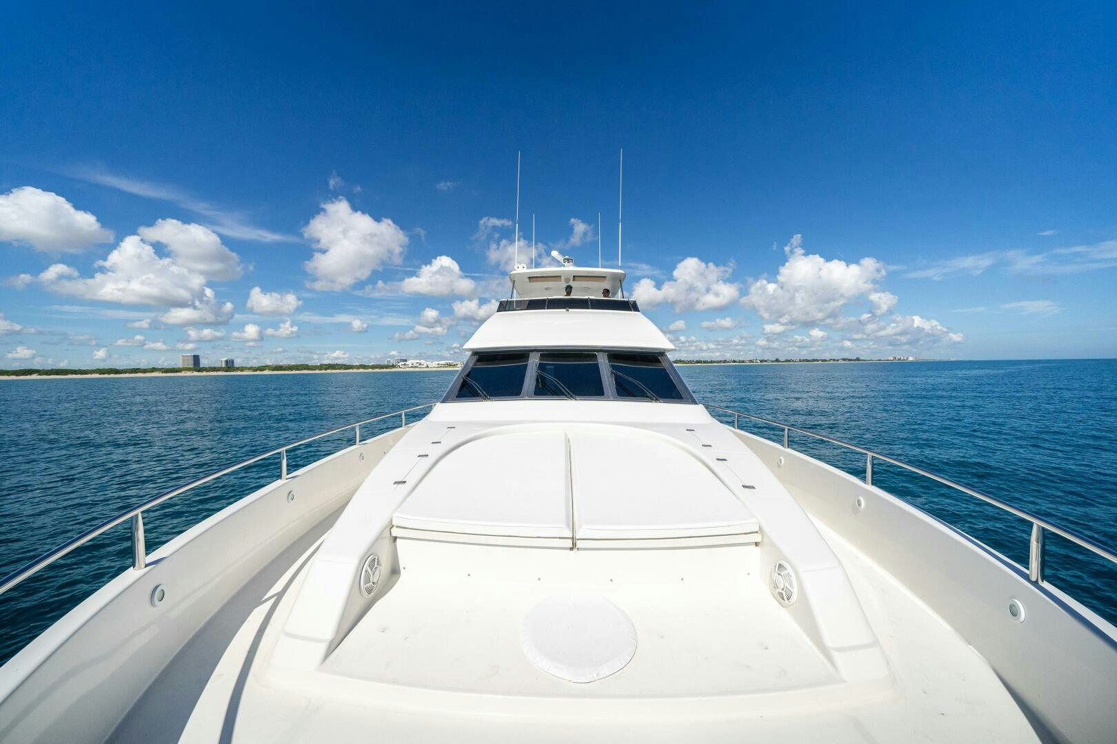 a boat on the water aboard PRESTIGE WORLDWIDE Yacht for Sale