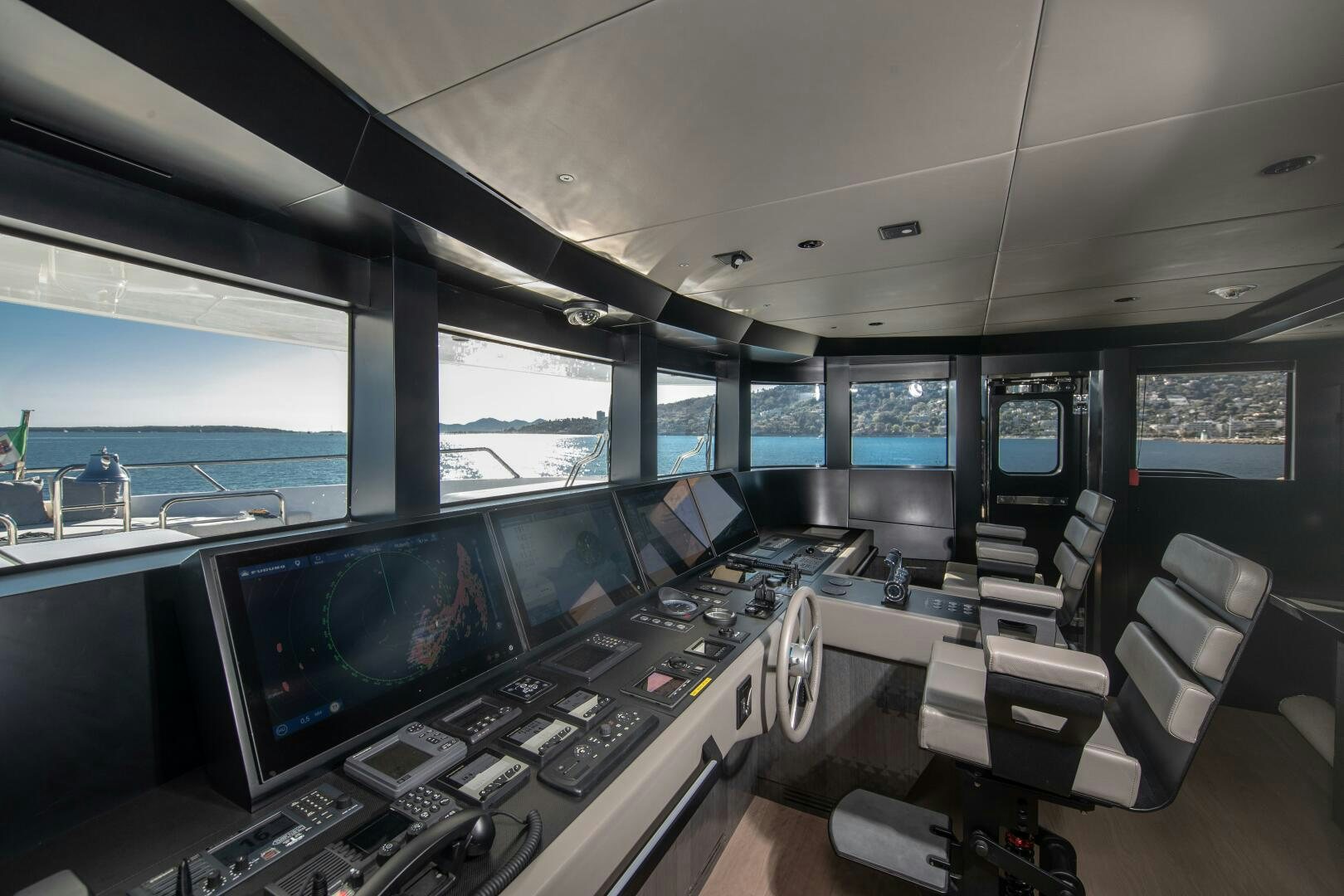 a room with many computers aboard OCEANIC 140 Yacht for Sale
