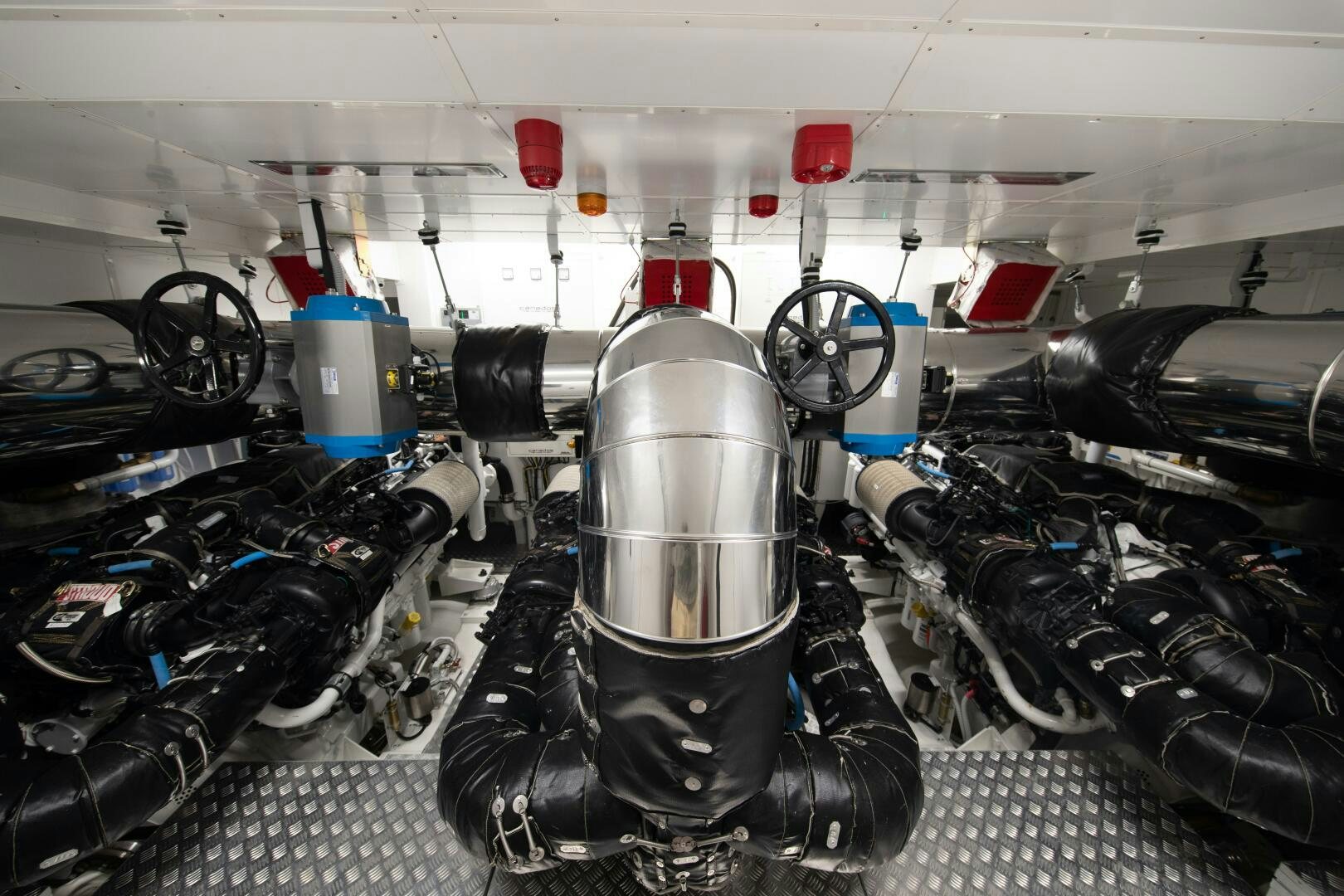 a machine with a large metal cylinder aboard OCEANIC 140 Yacht for Sale