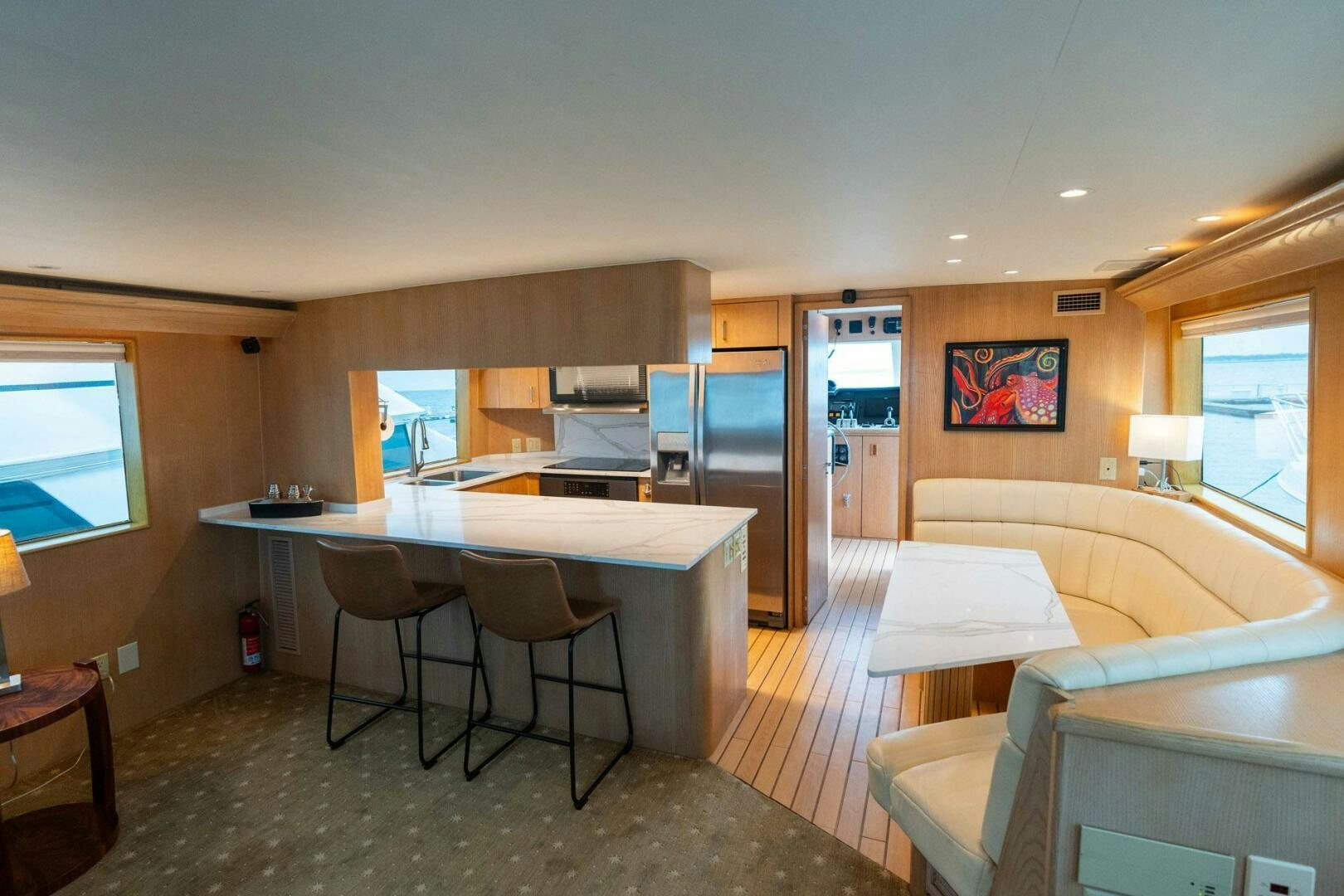 a kitchen and living room aboard KRAKEN Yacht for Sale